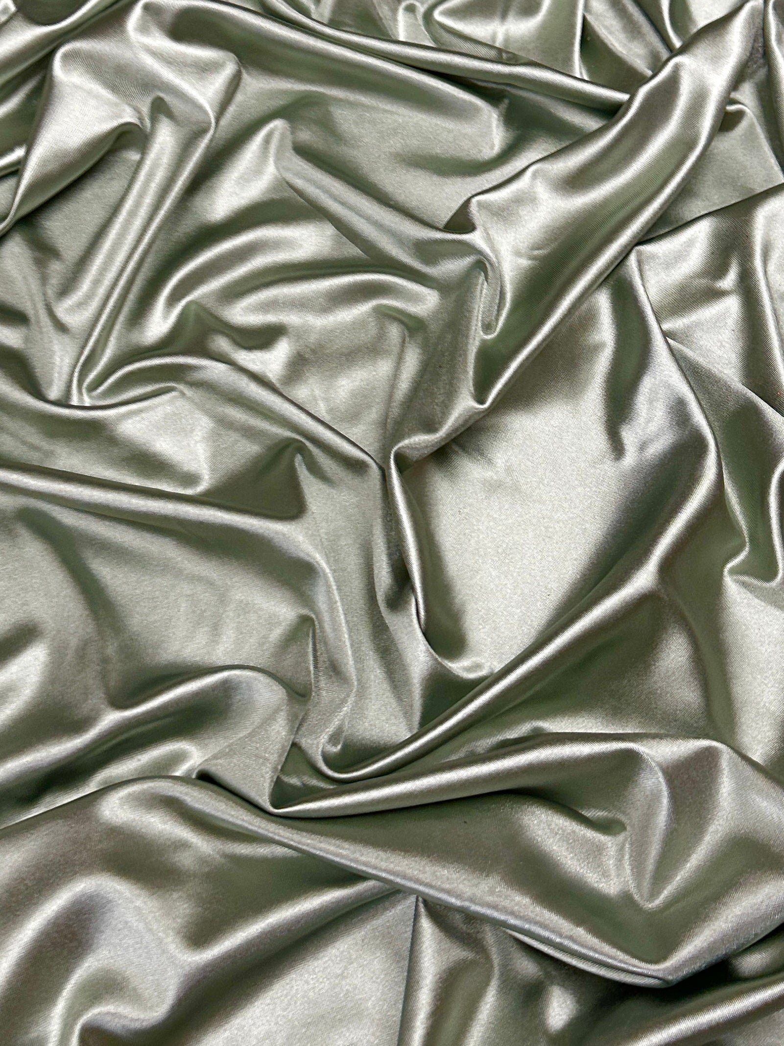 Sage Green Shiny Nylon Spandex, green nylon spandex, 4 Way Stretch nylon spandex, dark green nylon spandex, shiny nylon spandex for woman, shiny nylon for bride, spandex for swim wear, premium spandex, spandex on sale, low price spandex