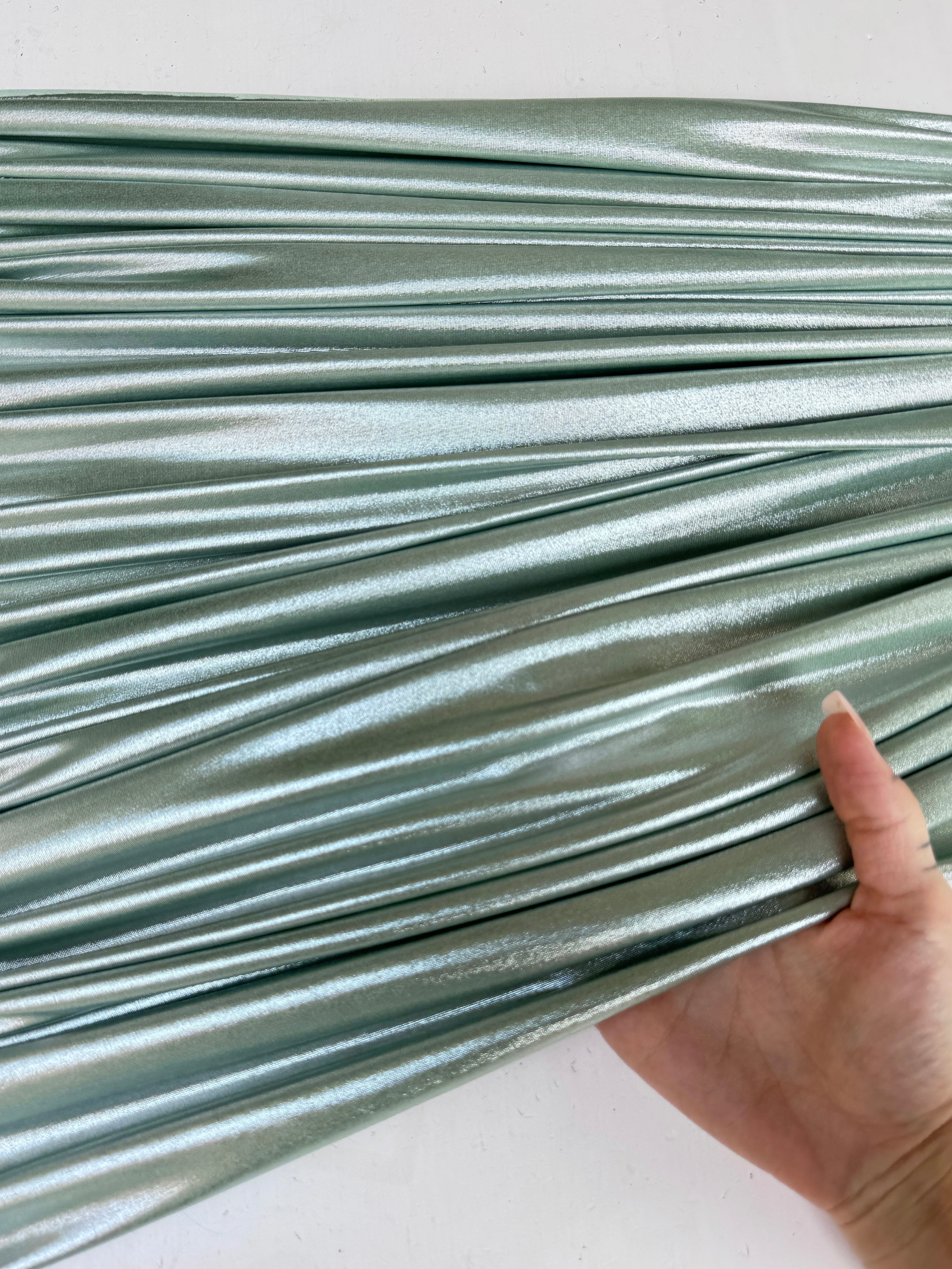 sage green stretch foiled spandex, dark green stretch foiled spandex, light green stretch foiled spandex, dark green stretch foiled spandex, premium stretch foiled spandex, stretch foiled spandex on sale, stretch foiled spandex on discount