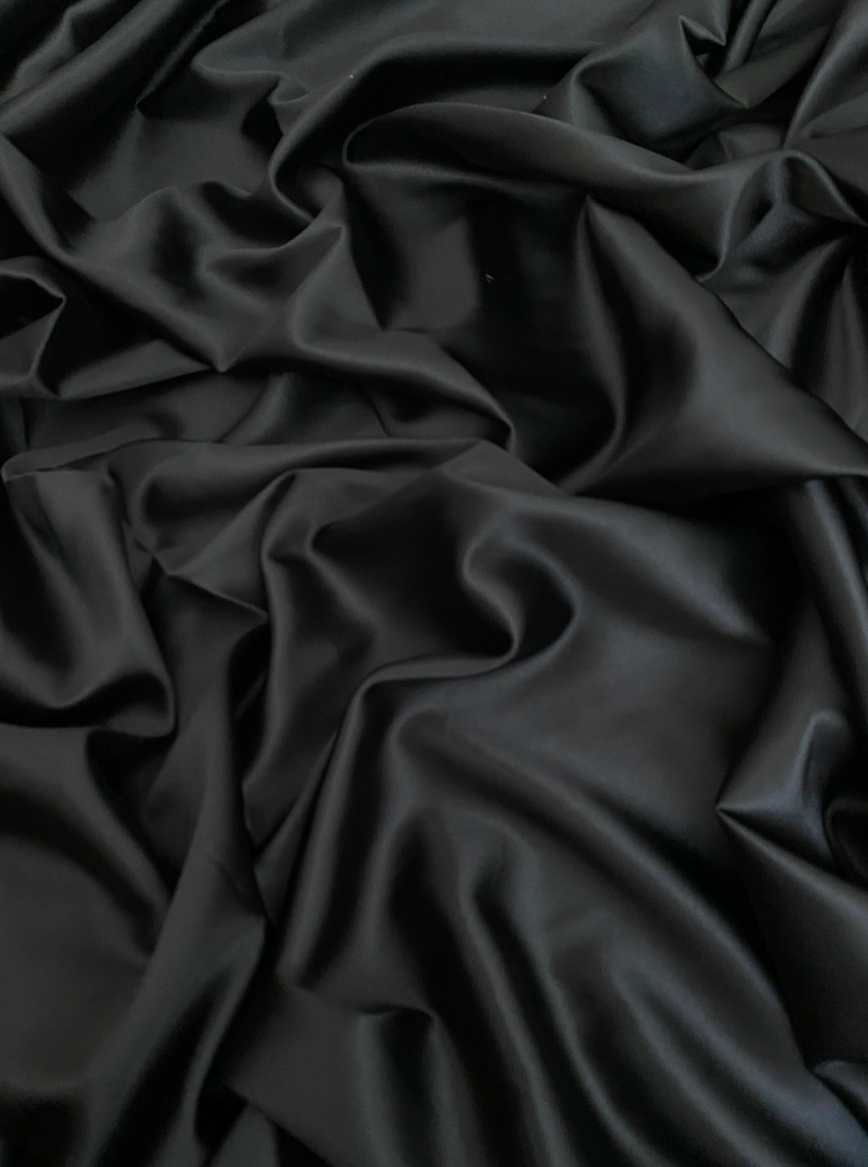 black stretch silk charmeuse, black polyester silk, black polyester satin, bridal satin, bridal silk, satin silk black, mulberry silk black, silk material by the yard, satin material by the yard, black bridal silk, black shiny fabric, black liquid fabric, black silk for slip dress, black silk for robe, black satin for dress, black satin for gown, black silk for bonnet, black silk for hair wrap, silk fabric for scrunchies
