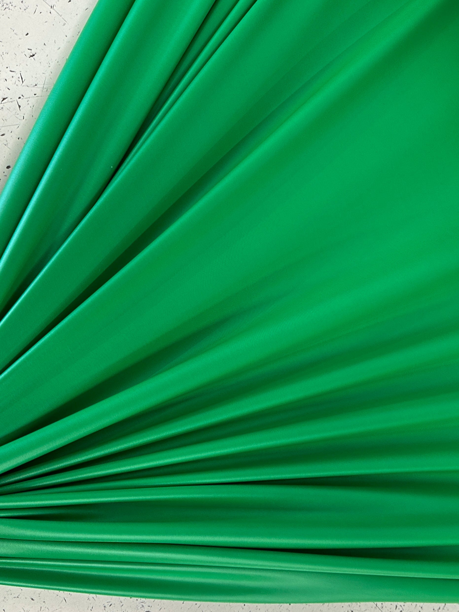 kelly green all way Stretch Faux Leather, green all way stretch leather, shiny faux leather, light green all way stretch faux leather for woman, faux leather for costumes, faux leather for home decor, 2 way stretch faux leather, leather for blazers, cheap leather, discounted leather, leather on sale