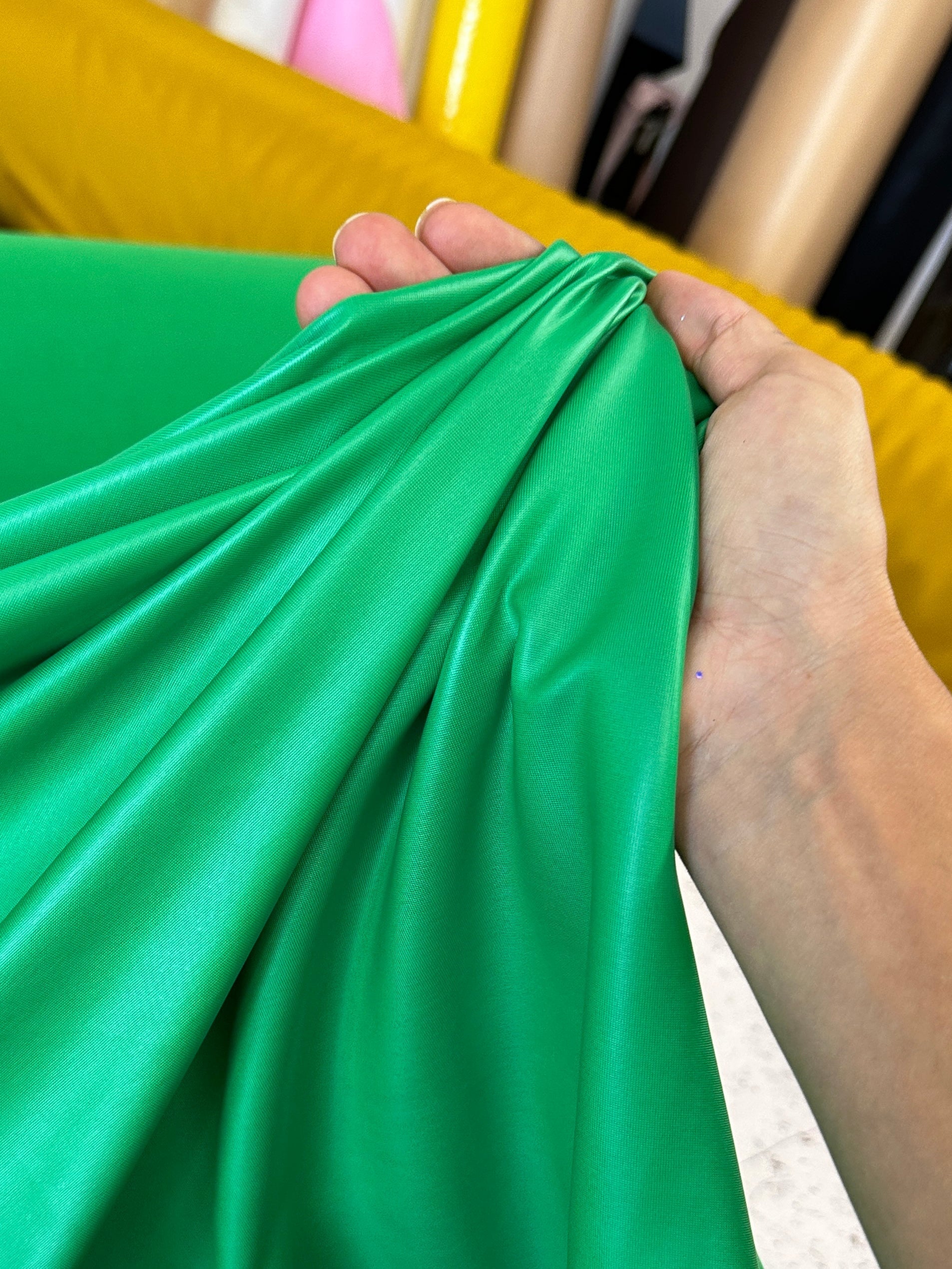 kelly green all way Stretch Faux Leather, green all way stretch leather, shiny faux leather, light green all way stretch faux leather for woman, faux leather for costumes, faux leather for home decor, 2 way stretch faux leather, leather for blazers, cheap leather, discounted leather, leather on sale