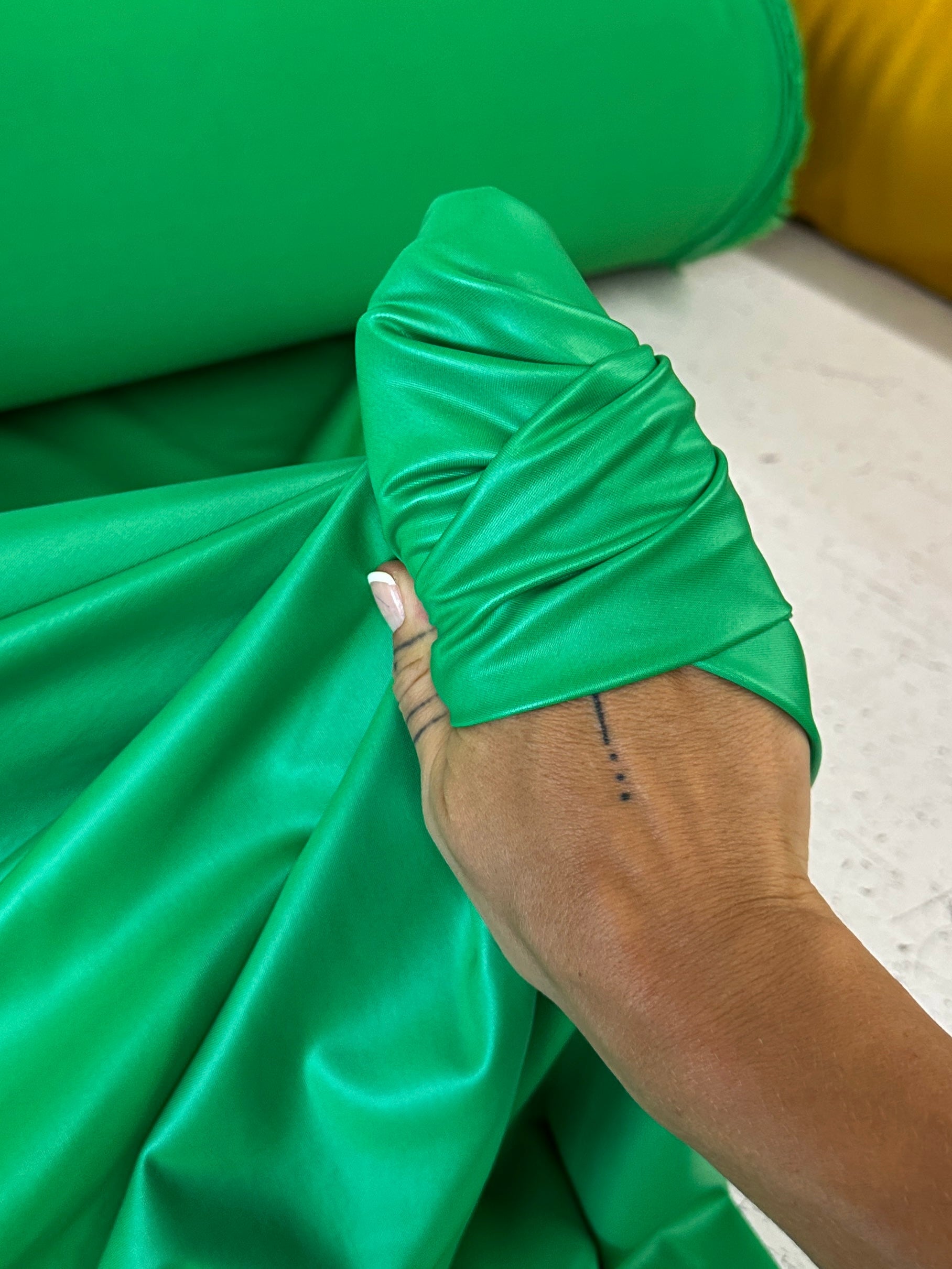 kelly green all way Stretch Faux Leather, green all way stretch leather, shiny faux leather, light green all way stretch faux leather for woman, faux leather for costumes, faux leather for home decor, 2 way stretch faux leather, leather for blazers, cheap leather, discounted leather, leather on sale
