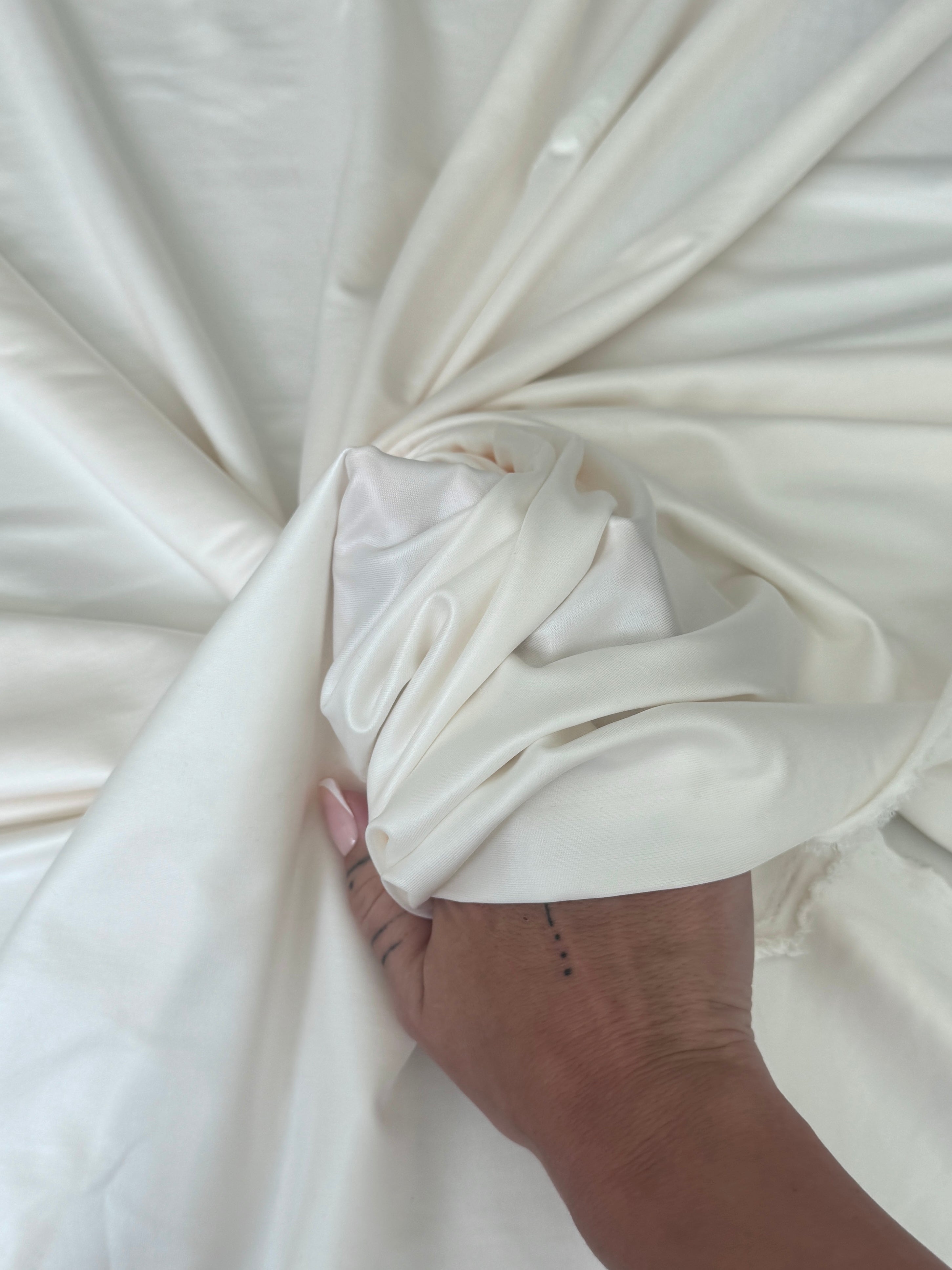 ivory 4 Way Stretch Faux Leather, white all way stretch faux leather for woman, off white faux leather for costumes, faux leather for home decor, 4 way stretch faux leather, leather for blazers, cheap leather, discounted leather, leather on sale