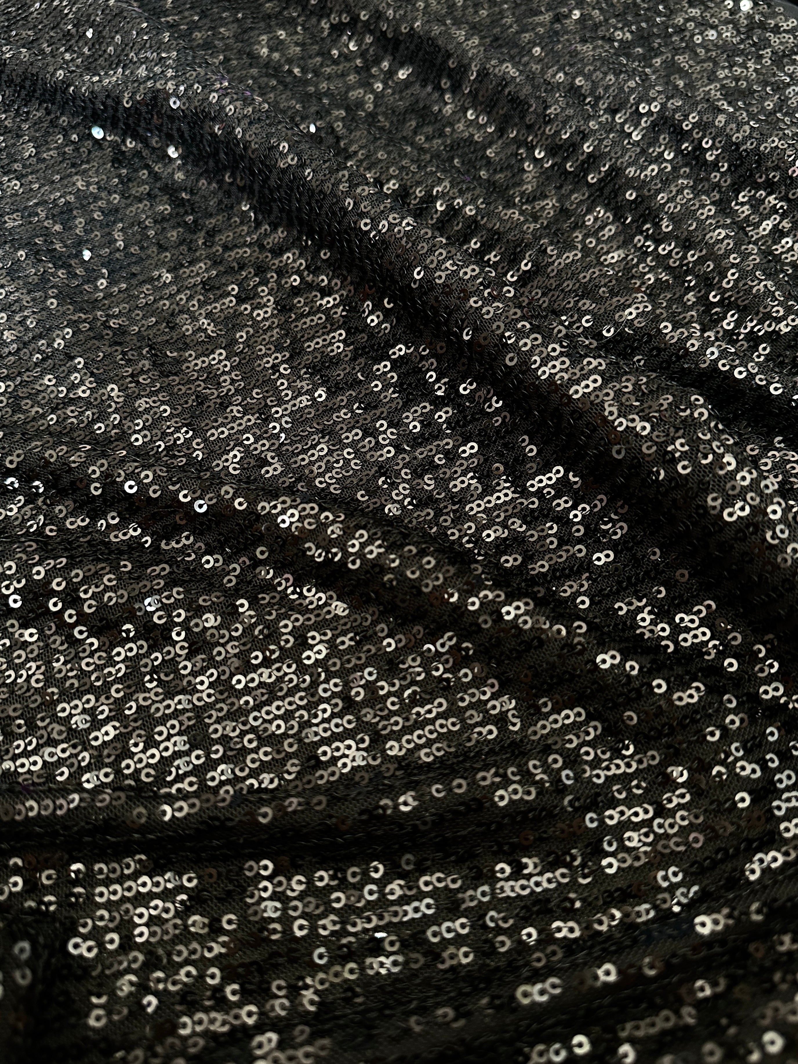 black super stretch sequin on mesh, dark grey sequin on mesh, jet black sequin on mesh, sequin on mesh for woman, sequin on mesh for bride, sequin on mesh on discount, sequin on mesh on sale, premium sequin on mesh, kiki textile sequin on mesh, sequin on mesh for party wear