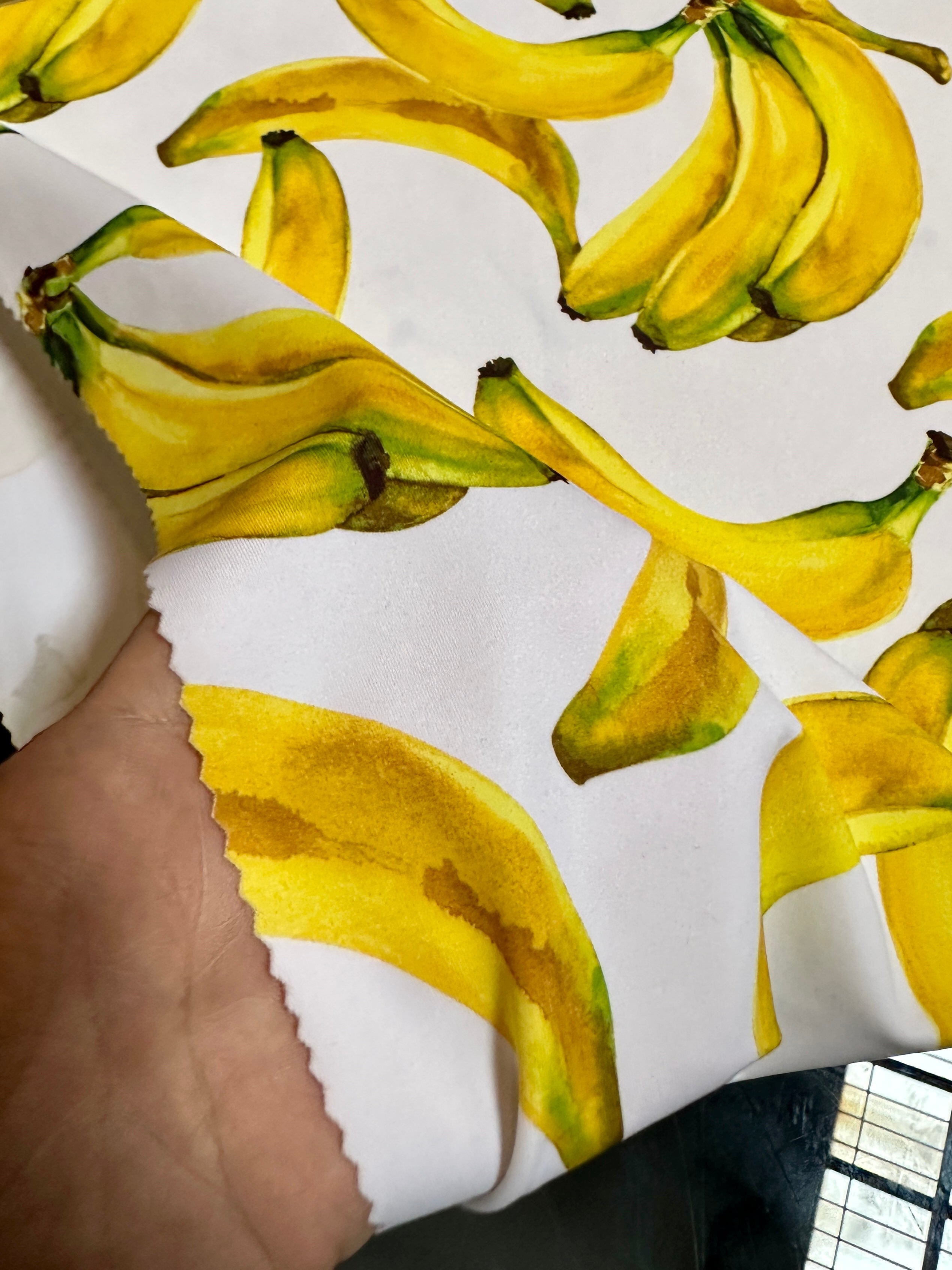 banana print fabric, banana white nylon spandex, printed spandex fabric, spandex for legging, fabric for dancewear, kikitextiles, printed fabric, spandex store usa, spandex for woman, spandex on sale, spandex on discount, premium spandex