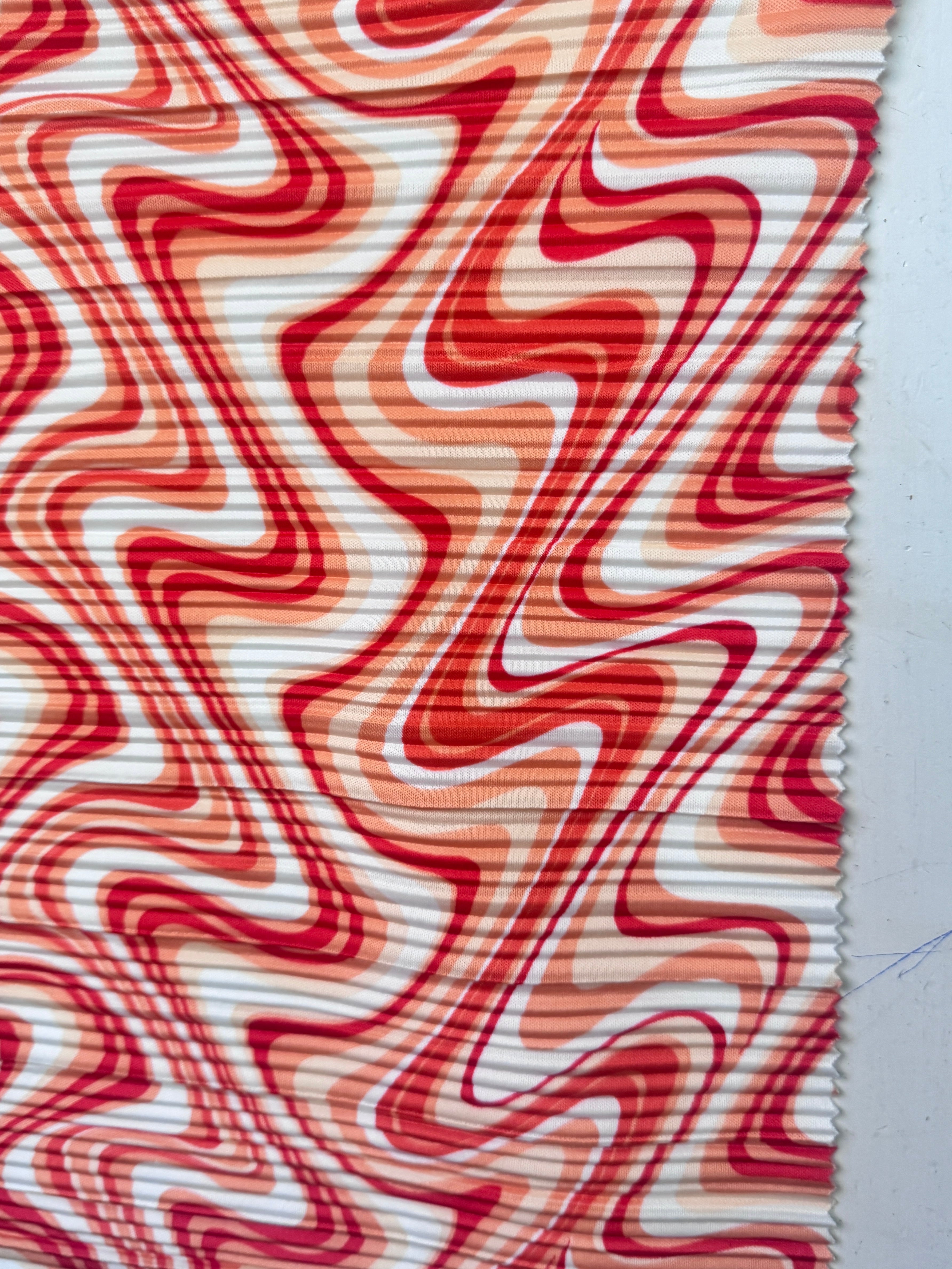 Orange Print Pleated Knit, online textile store, sewing, fabric store, sewing store, cheap fabric store, kiki textiles