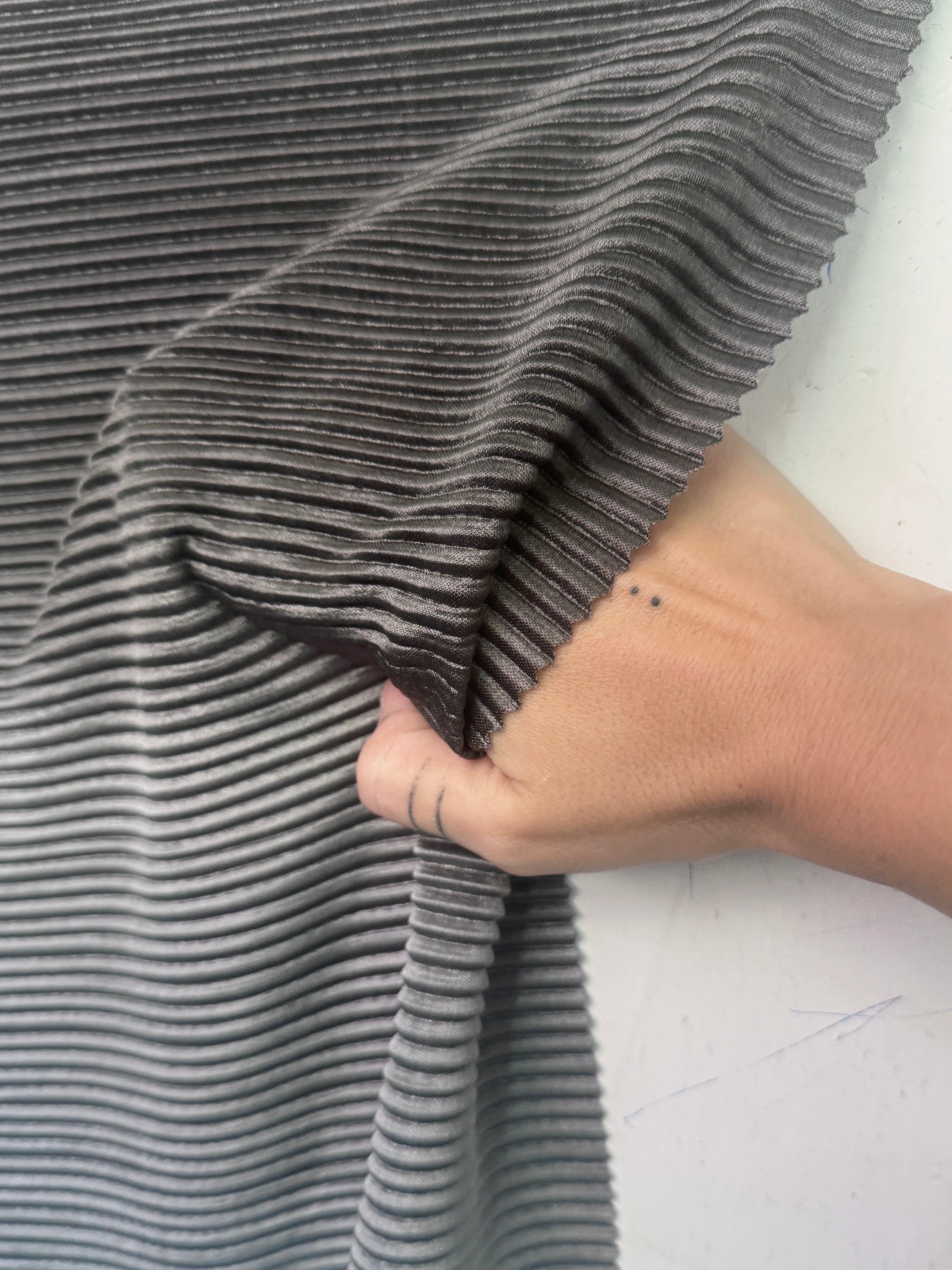 Silver Ombre Pleated Knit, silver pleated knit, silver pleated fabric, pleated spandex, spandex fabric, kiki textiles, sewing, charcoal textured knit
