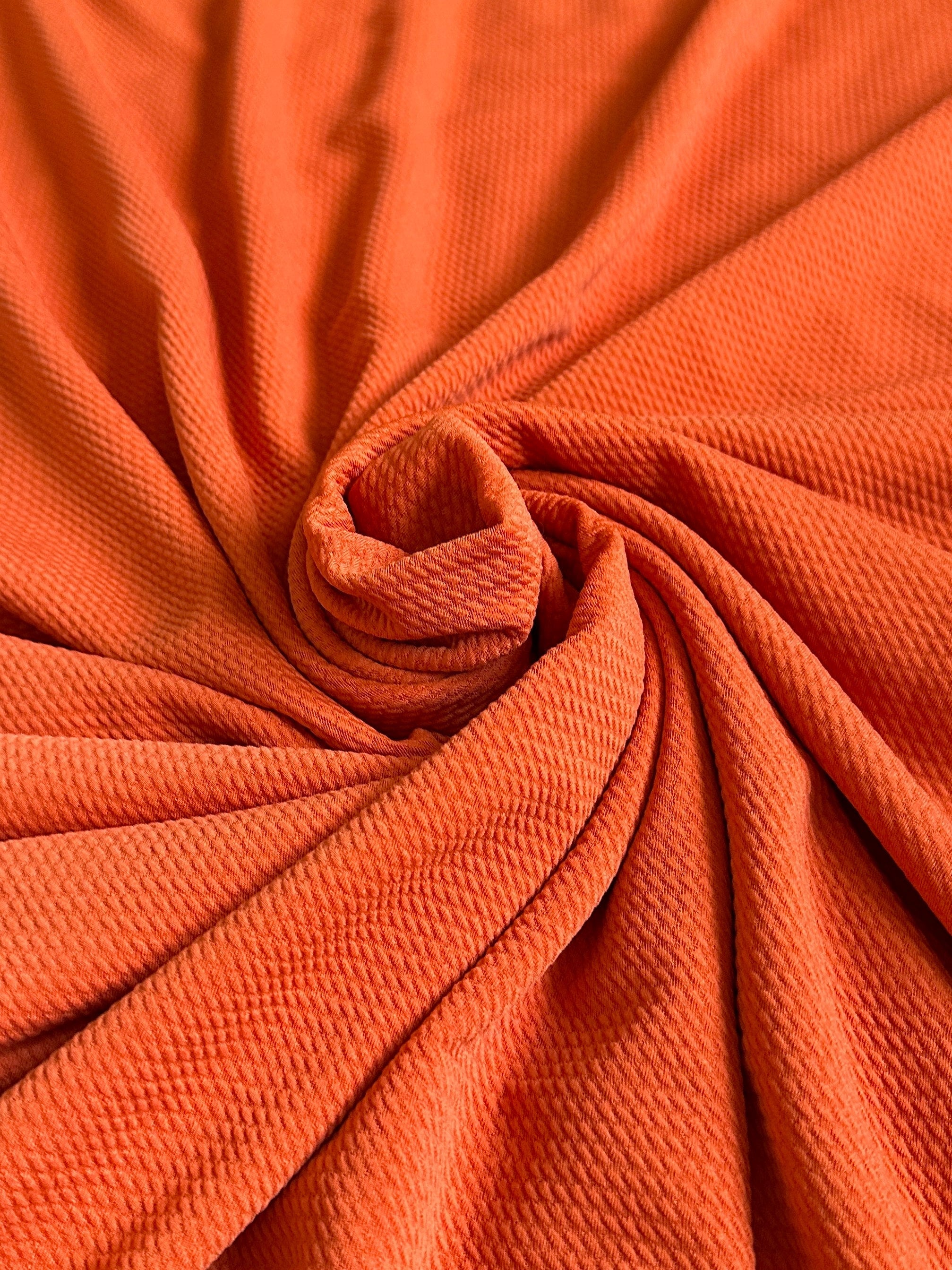 orange liverpool knit, dark orange liverpool knit, light orange liverpool knit, knit for woman, knit for bride, knit on discount, knit on sale, knit for gown, liverpool knit for party wear, premium liverpool knit, kiki textile liverpool knit