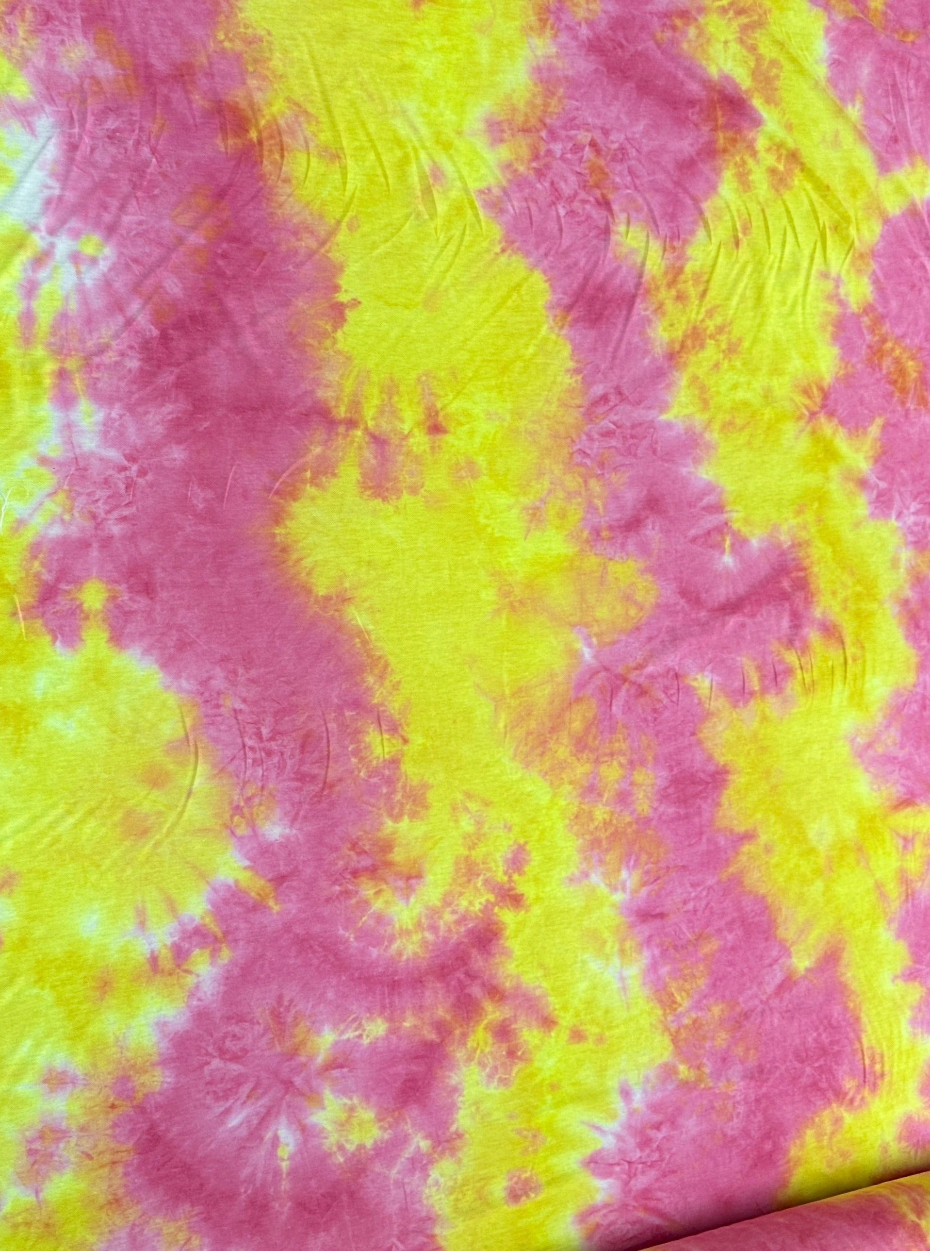 Yellow and Pink Tie Dye Jersey Knit, tie dye jersey knit for woman, tie dye jersey knit for party wear, tie dye jersey knit for gown, tie dye jersey knit for bride, tie dye jersey knit on discount, tie dye jersey knit on sale, premium tie dye jersey knit