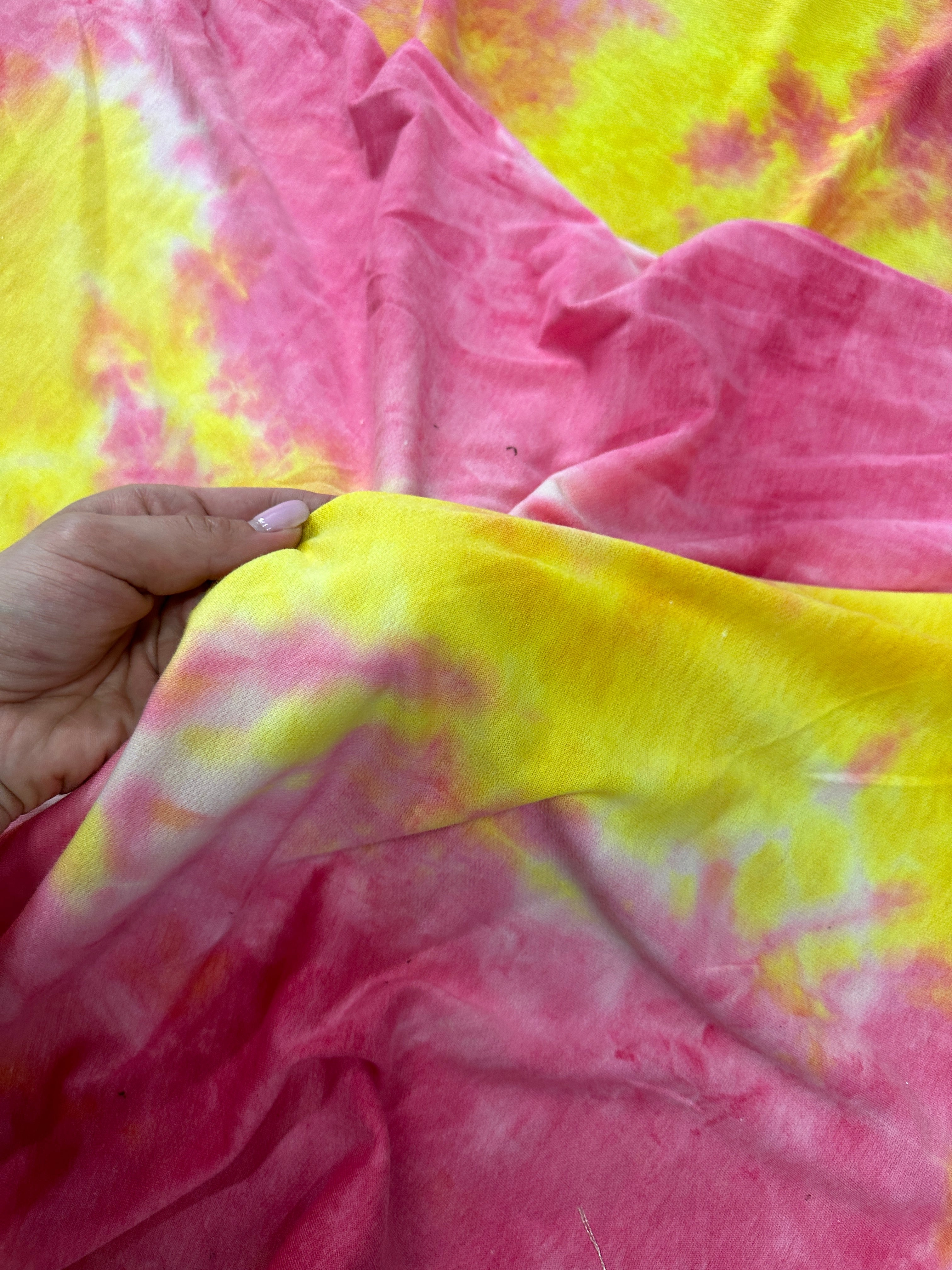 Yellow and Pink Tie Dye Jersey Knit, tie dye jersey knit for woman, tie dye jersey knit for party wear, tie dye jersey knit for gown, tie dye jersey knit for bride, tie dye jersey knit on discount, tie dye jersey knit on sale, premium tie dye jersey knit