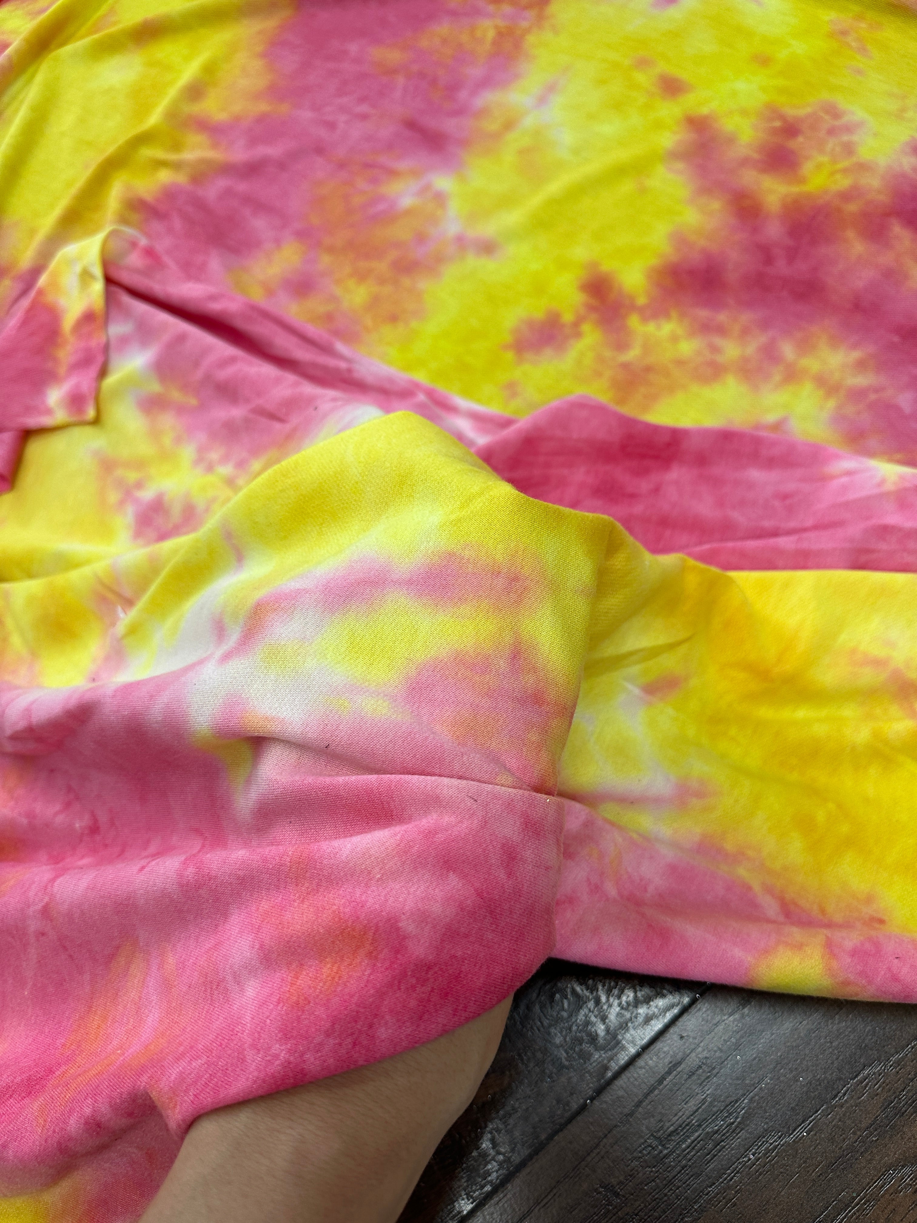 Yellow and Pink Tie Dye Jersey Knit, tie dye jersey knit for woman, tie dye jersey knit for party wear, tie dye jersey knit for gown, tie dye jersey knit for bride, tie dye jersey knit on discount, tie dye jersey knit on sale, premium tie dye jersey knit
