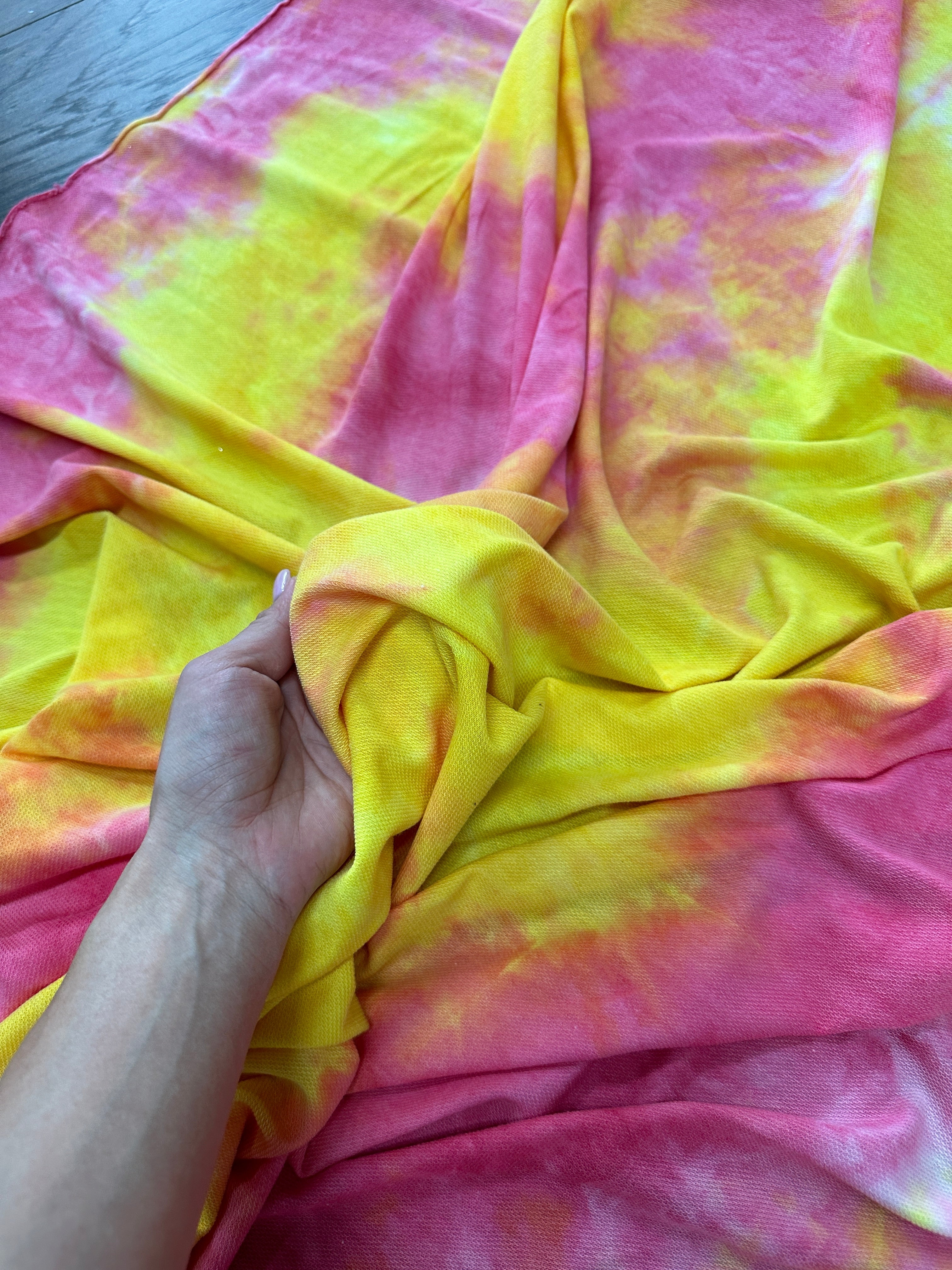 Yellow and Pink Tie Dye Jersey Knit, tie dye jersey knit for woman, tie dye jersey knit for party wear, tie dye jersey knit for gown, tie dye jersey knit for bride, tie dye jersey knit on discount, tie dye jersey knit on sale, premium tie dye jersey knit