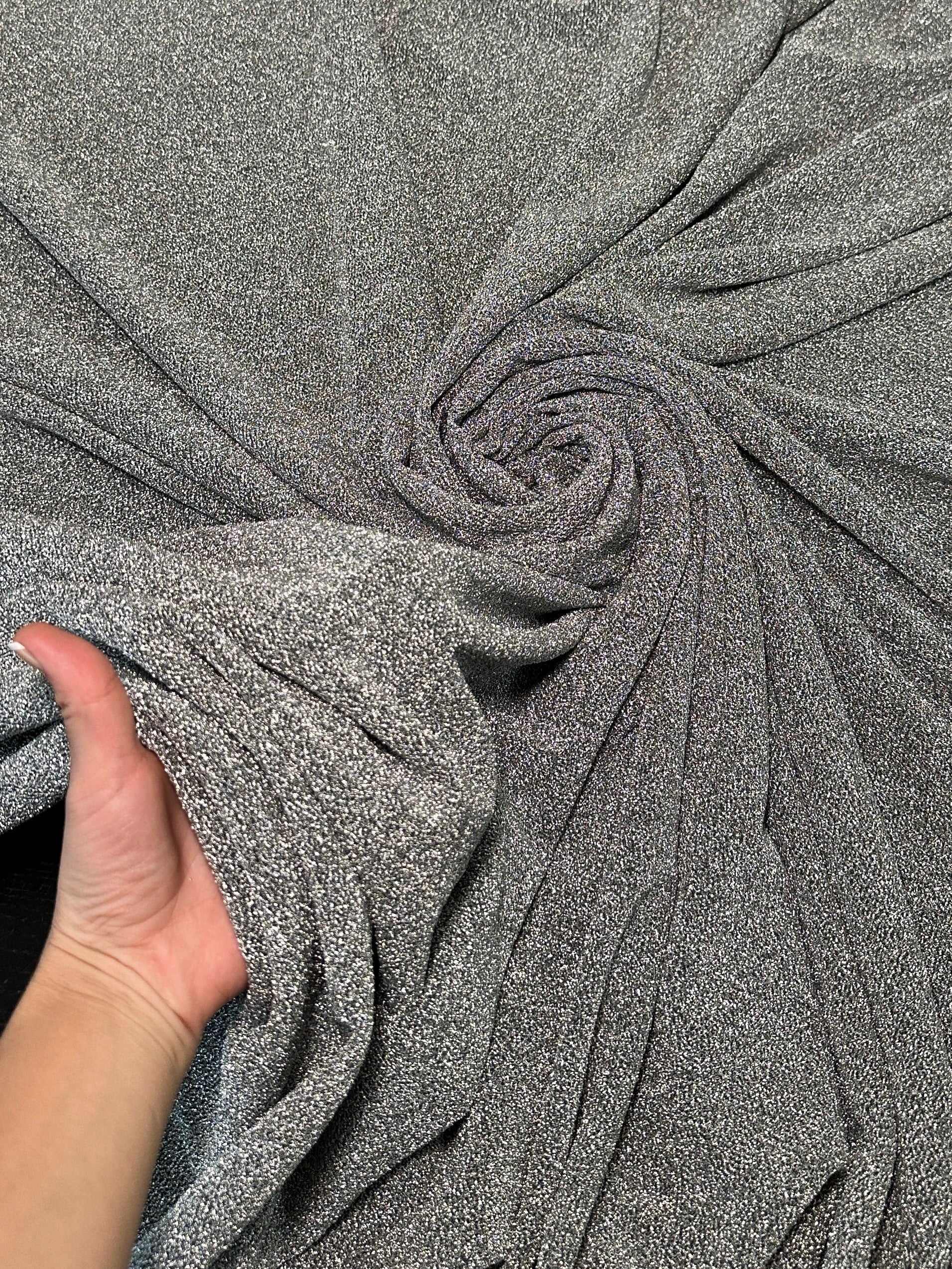 shimmery, glimmery, sparkle, sparkly, luxury, deluxe, luxurious, luxe, glitter, spandex lurex, all way stretch lurex, 4 way stretch lurex, two way stretch lurex, non shedding lurex, non shedding glitter fabric, medium weight,  silver Glitter Lurex Jersey, dark silver glitter lurex jersey, light silver lurex jersey, shinny silver lurex jersey