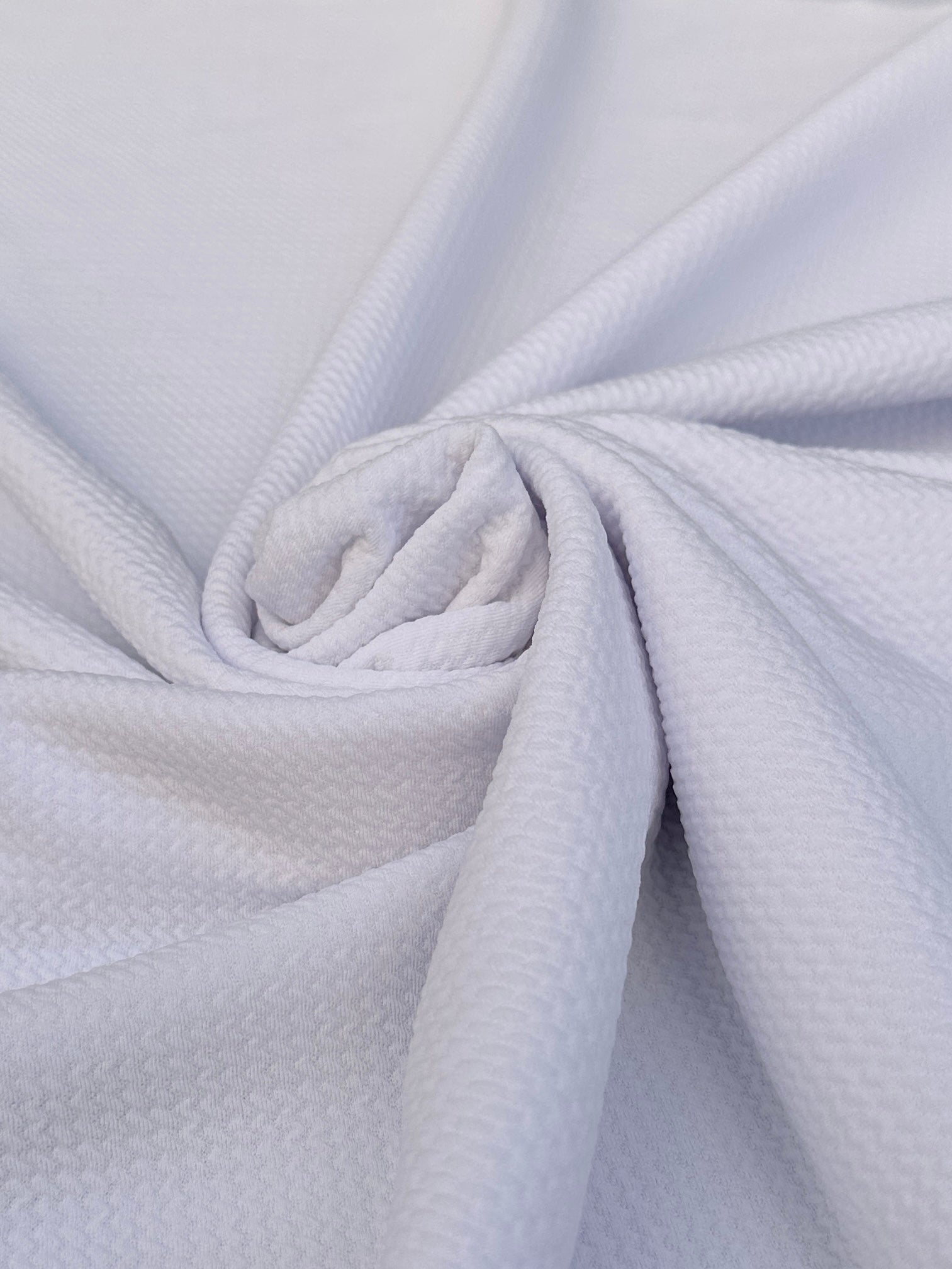 white liverpool knit, off white liverpool knit, bright white liverpool knit, knit for woman, knit for bride, knit on discount, knit on sale, knit for gown, liverpool knit for party wear, premium liverpool knit, kiki textile liverpool knit