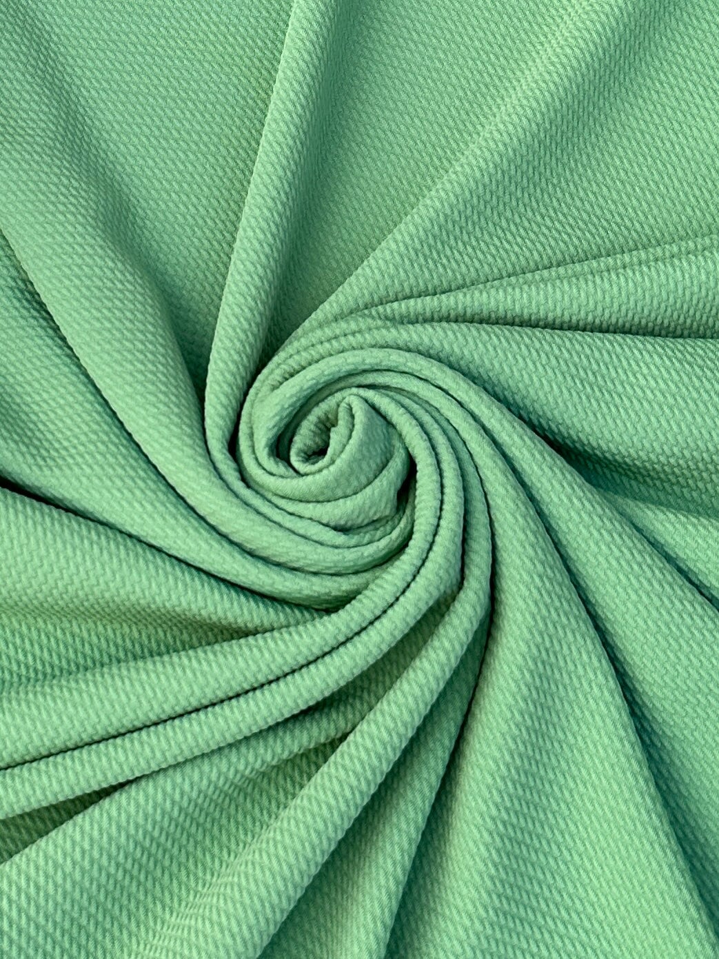sage green liverpool knit, green liverpool knit, light green liverpool knit, knit for woman, knit for bride, knit on discount, knit on sale, knit for gown, liverpool knit for party wear, premium liverpool knit, kiki textile liverpool knit