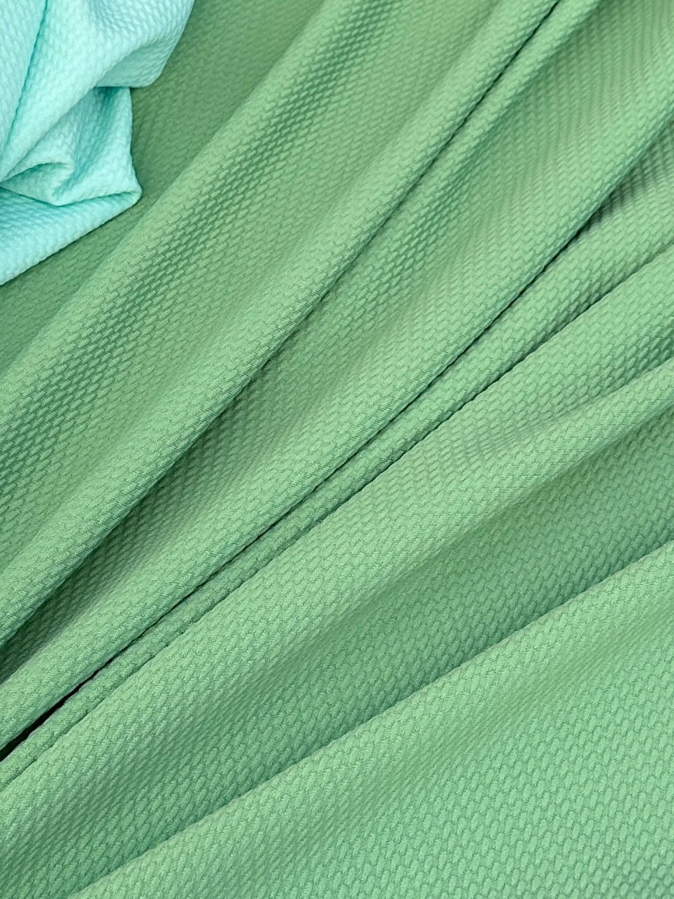 sage green liverpool knit, green liverpool knit, light green liverpool knit, knit for woman, knit for bride, knit on discount, knit on sale, knit for gown, liverpool knit for party wear, premium liverpool knit, kiki textile liverpool knit