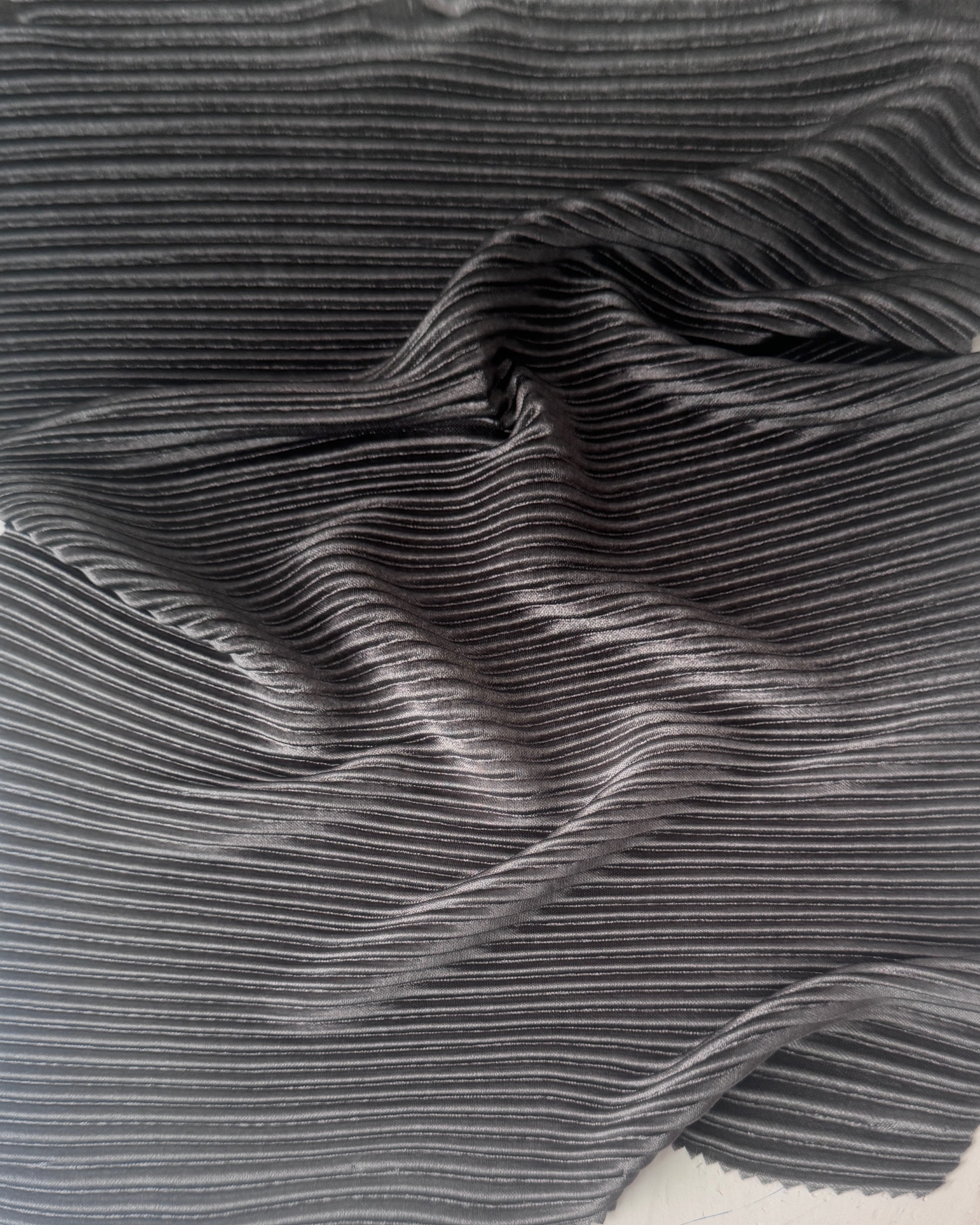 Silver Ombre Pleated Knit, silver pleated knit, silver pleated fabric, pleated spandex, spandex fabric, kiki textiles, sewing, charcoal textured knit