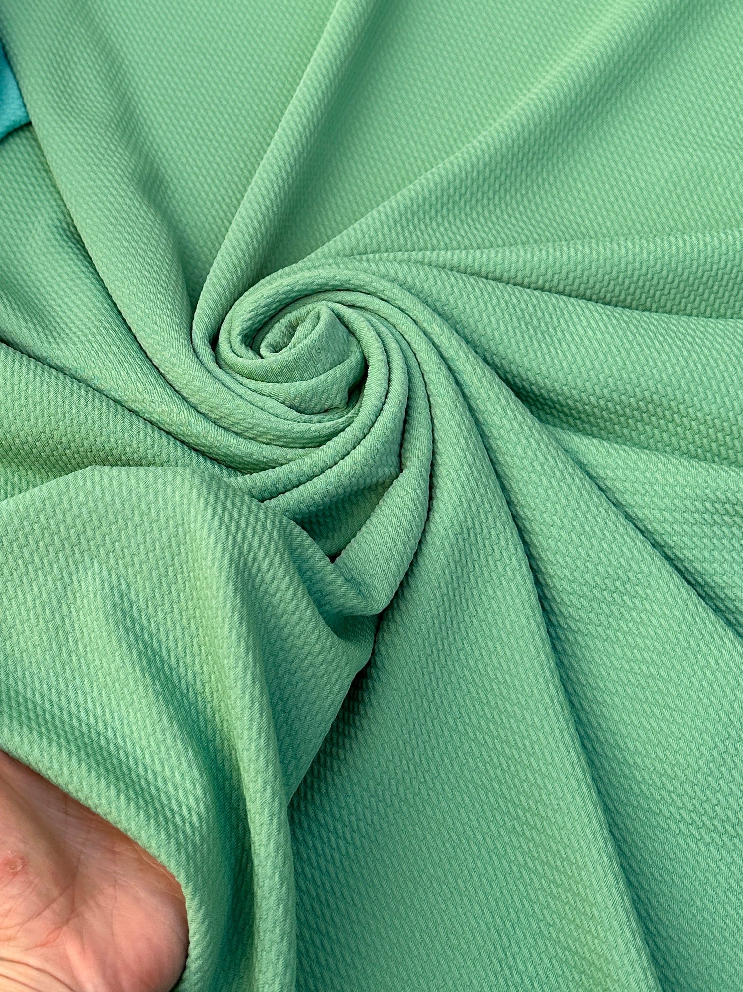 sage green liverpool knit, green liverpool knit, light green liverpool knit, knit for woman, knit for bride, knit on discount, knit on sale, knit for gown, liverpool knit for party wear, premium liverpool knit, kiki textile liverpool knit