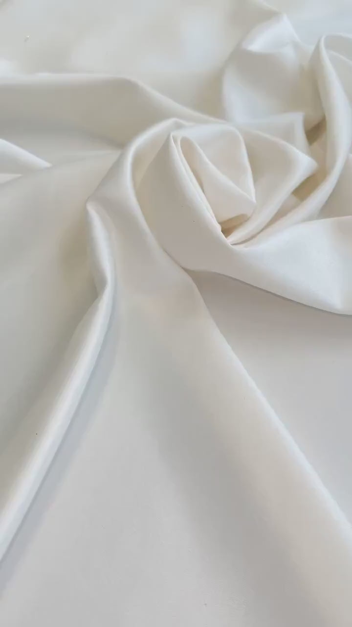 off white stretch crepe back satin, white stretch crepe back satin, milky white stretch crepe back satin, premium stretch crepe back satin, satin for bride, satin for woman, satin in low price, cheap satin, satin on sale