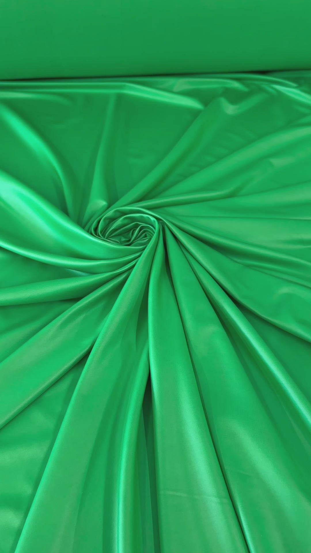 kelly green all way Stretch Faux Leather, green all way stretch leather, shiny faux leather, light green all way stretch faux leather for woman, faux leather for costumes, faux leather for home decor, 2 way stretch faux leather, leather for blazers, cheap leather, discounted leather, leather on sale