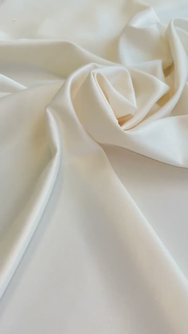 off white stretch crepe back satin, white stretch crepe back satin, milky white stretch crepe back satin, premium stretch crepe back satin, satin for bride, satin for woman, satin in low price, cheap satin, satin on sale