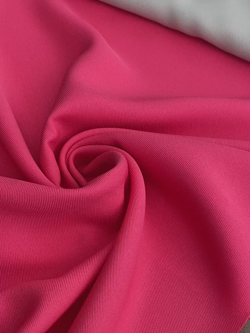 coral delaney gabardine, hot pink gabardine, pink gabardine, fuchsia gabardine, bright pink gabardine, gabardine material, kiki textiles, gabardine store in usa, twill gabardine, wrinkle free fabric, soft gabardine, solid color fabric, gabardine for suit, bridal fabric, gabardine material by yard, gabardine fabric