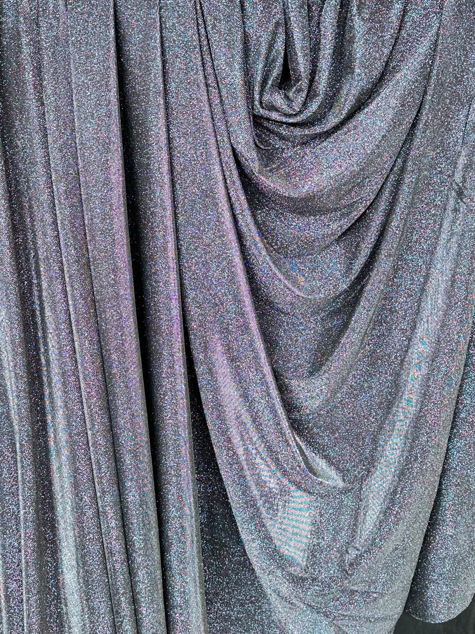 silver iridescent metallic lurex, silver lurex, silver metallic lurex for woman, light silver lurex, party wear metallic lurex, shiny lurex, metallic lurex for bride, lurex on discount, lurex on sale, buy metallic lurex online, lurex for gown, dark silver lurex