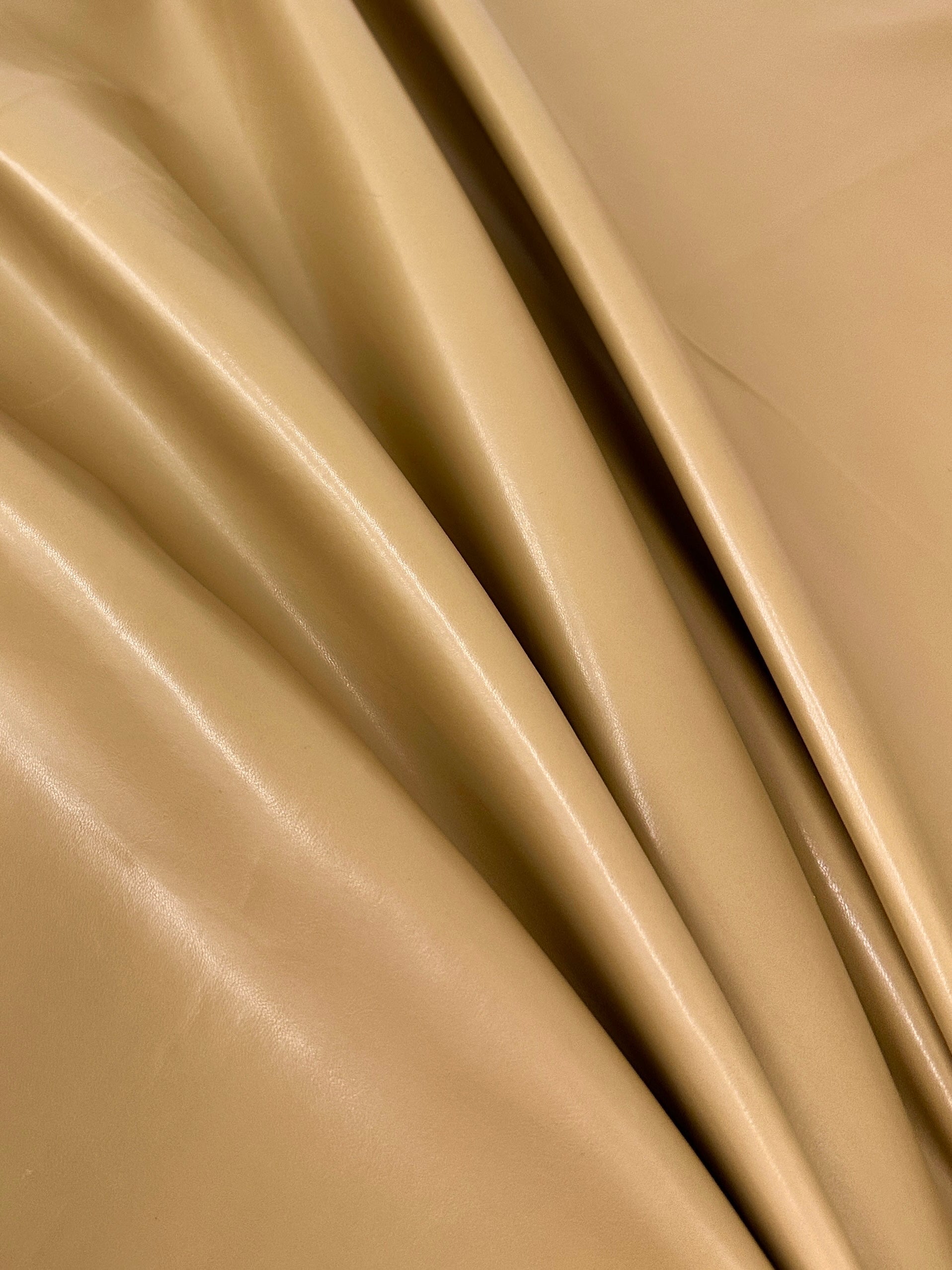 caramel Stretch Faux Leather, light brown stretch faux leather, cream color stretch faux leather, faux leather for woman, faux leather for costumes, faux leather for home decor, 2 way stretch faux leather, leather for blazers, cheap leather, discounted leather, leather on sale