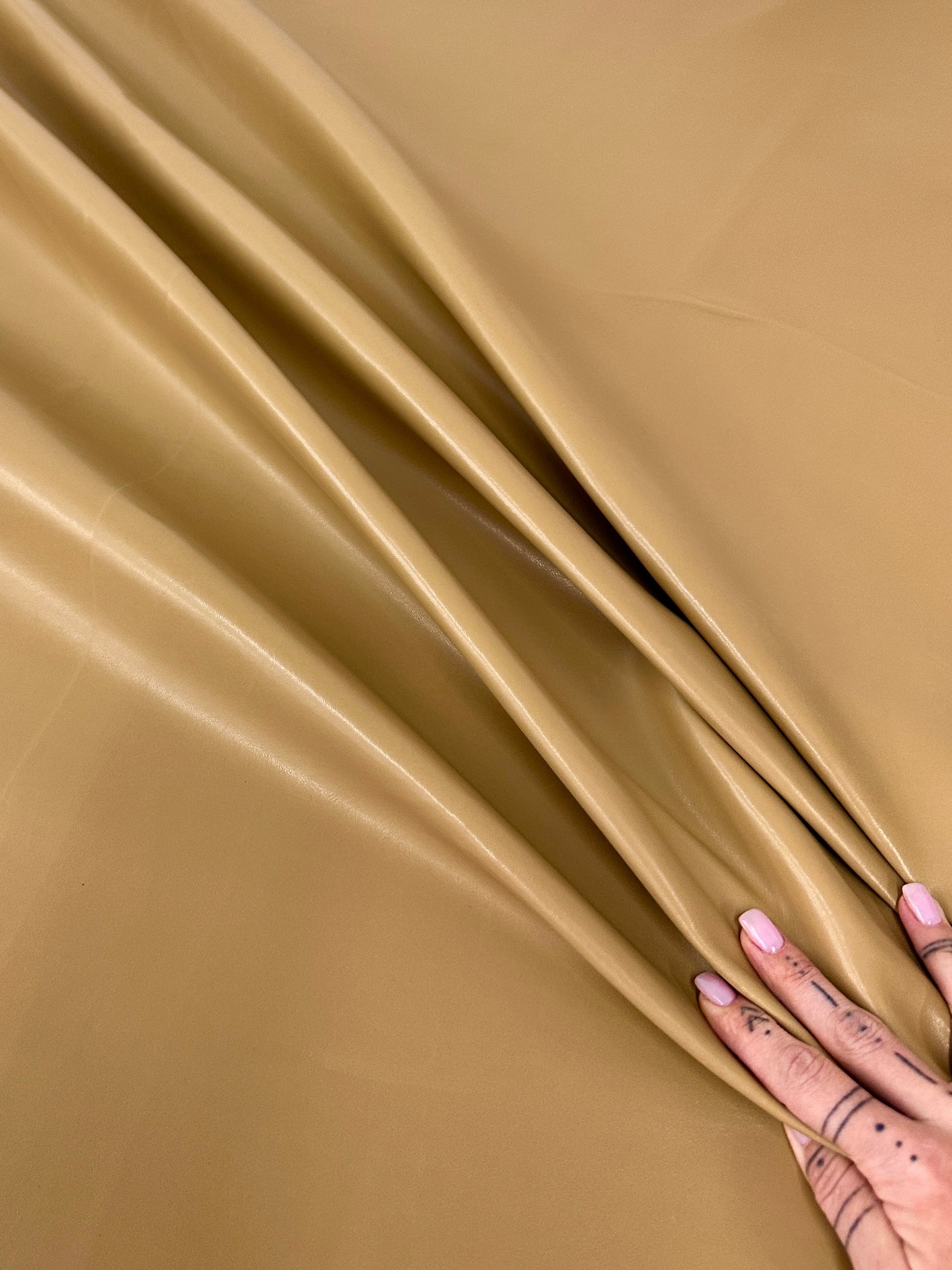 caramel Stretch Faux Leather, light brown stretch faux leather, cream color stretch faux leather, faux leather for woman, faux leather for costumes, faux leather for home decor, 2 way stretch faux leather, leather for blazers, cheap leather, discounted leather, leather on sale