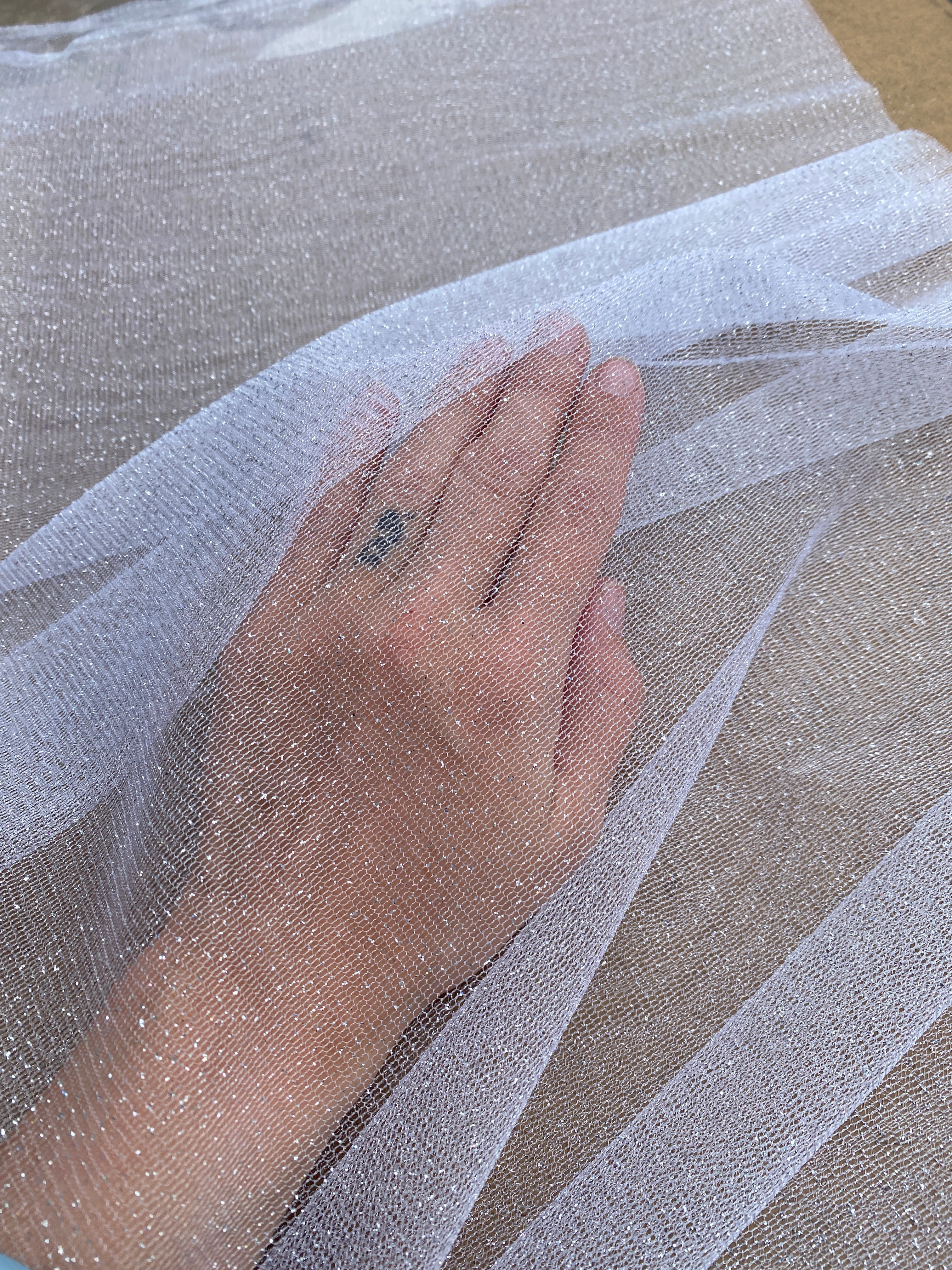 white glitter Tulle, bright white Tulle, off white tulle, milky white Tulle for party wear, white Tulle for dress, Tulle for woman, Tulle for bride, Tulle on discount, Tulle on sale, premium Tulle, buy Tulle online