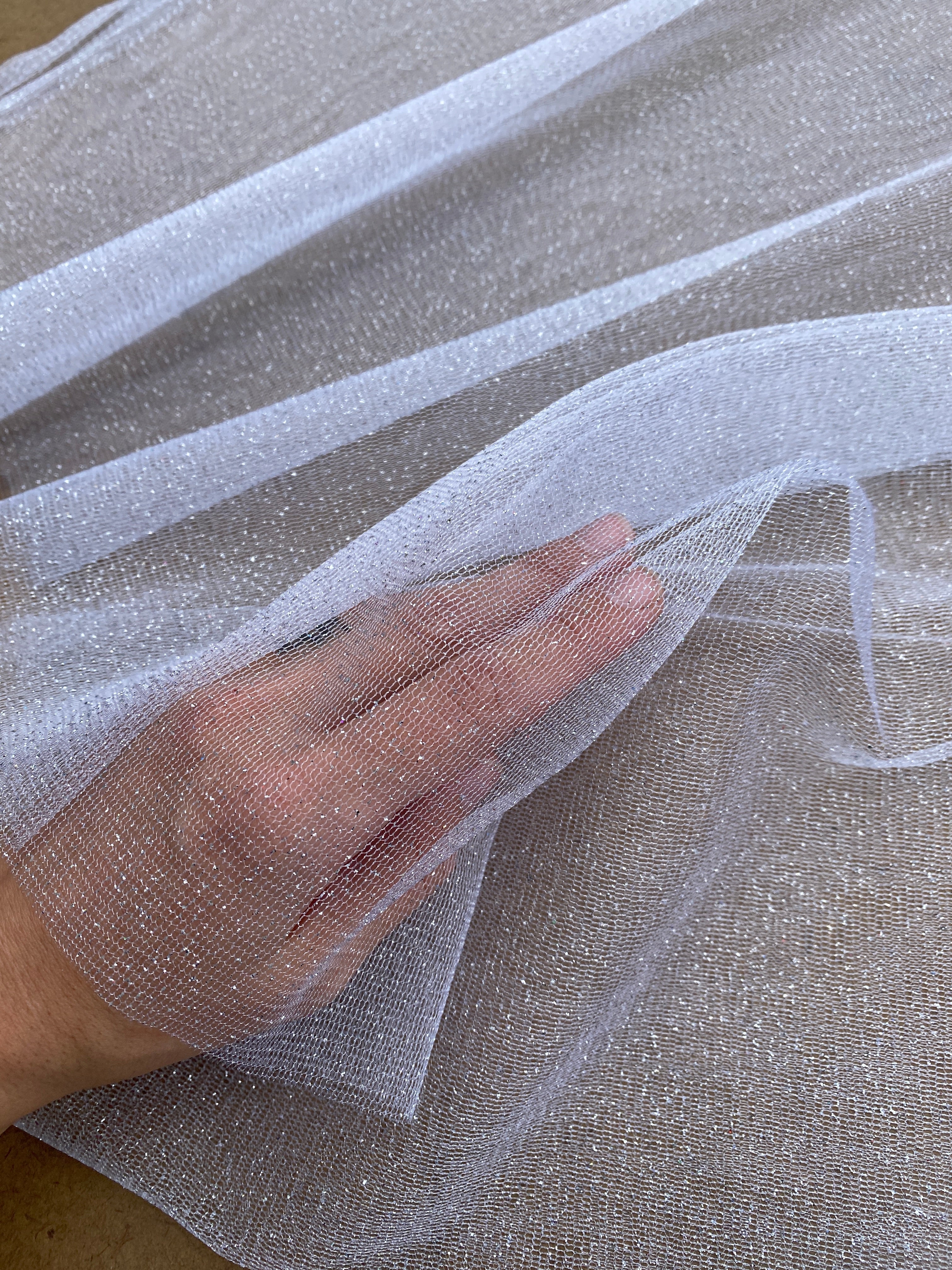 white glitter Tulle, bright white Tulle, off white tulle, milky white Tulle for party wear, white Tulle for dress, Tulle for woman, Tulle for bride, Tulle on discount, Tulle on sale, premium Tulle, buy Tulle online