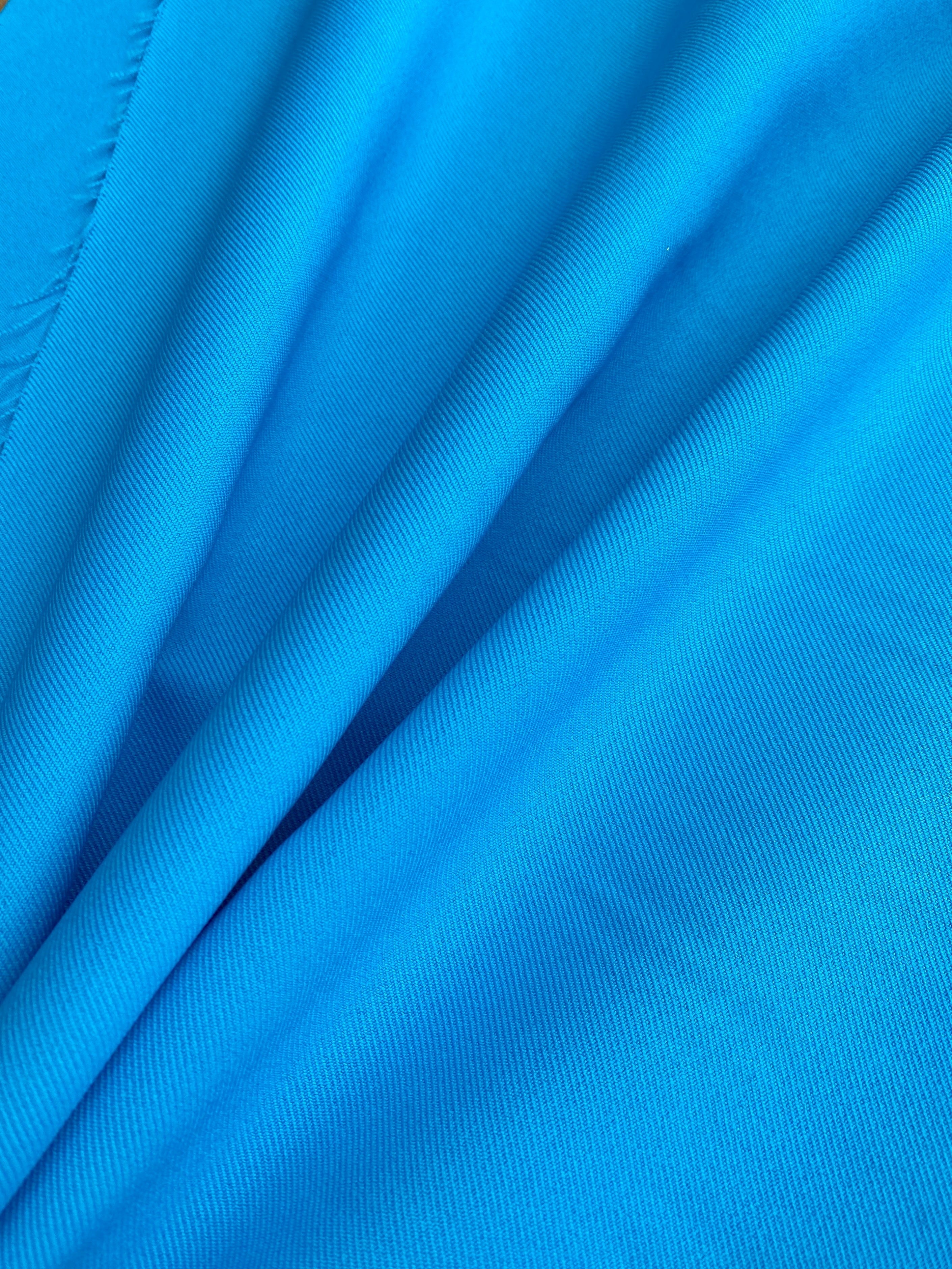 turquoise delaney gabardine, turquoise gabardine fabric, blue gabardine fabric, blue crepe and gabardine, royal bue gabardine fabric for pants, teal blue gabardine fabric for suit, blue gabardine and crepe, turquoise gabardine fabric for gown