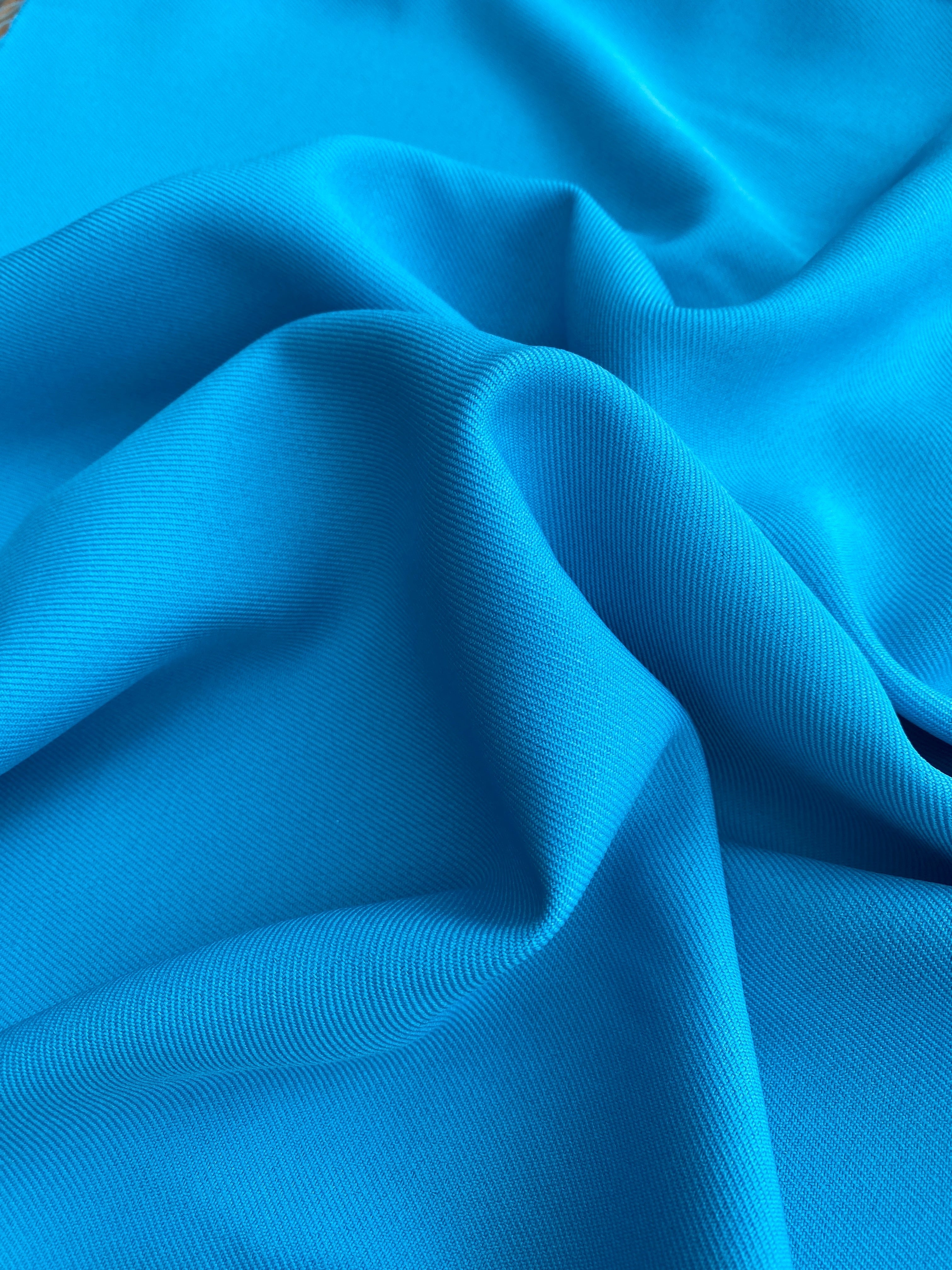 turquoise delaney gabardine, turquoise gabardine fabric, blue gabardine fabric, blue crepe and gabardine, royal bue gabardine fabric for pants, teal blue gabardine fabric for suit, blue gabardine and crepe, turquoise gabardine fabric for gown