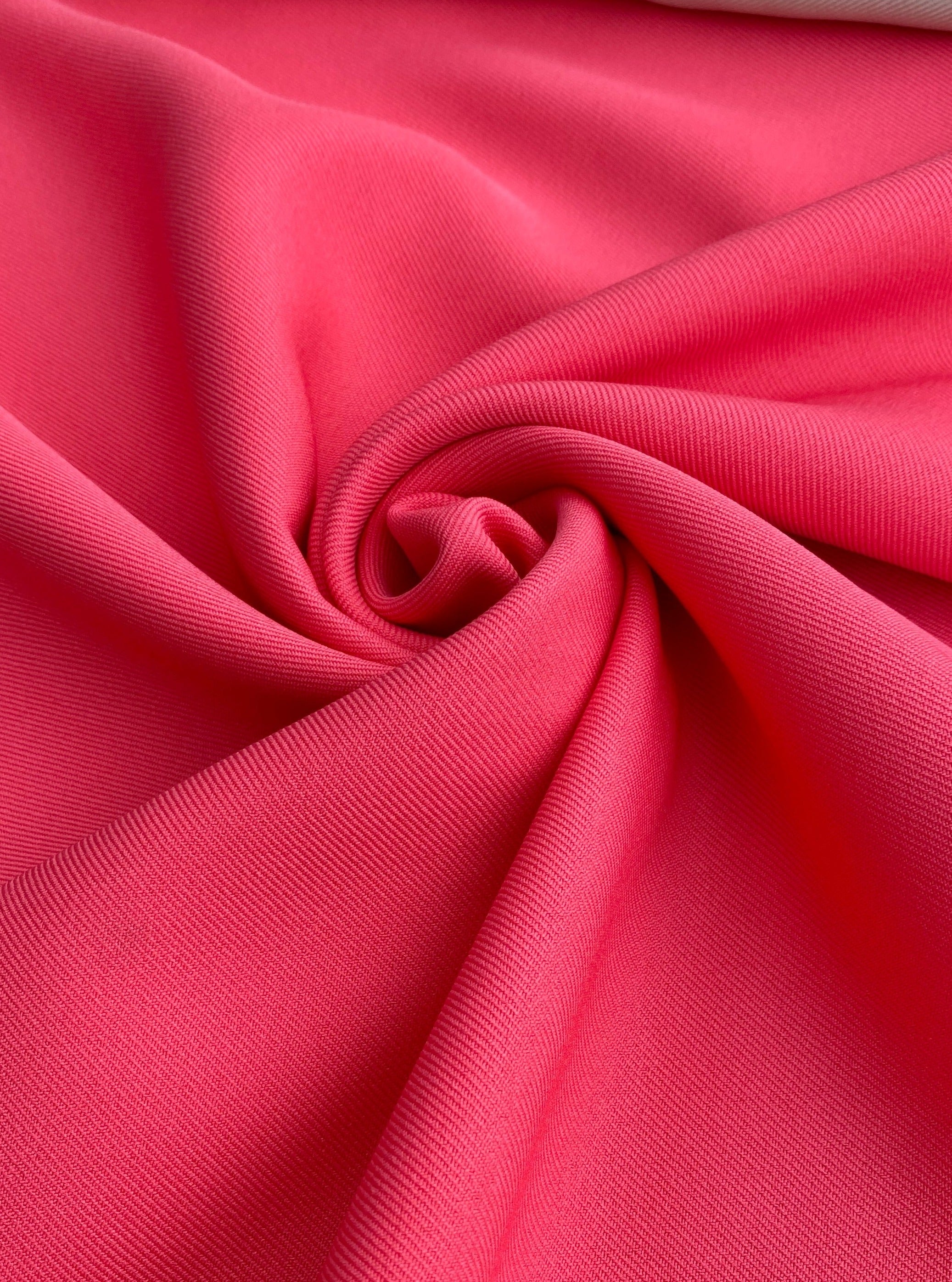 coral delaney gabardine, hot pink gabardine, pink gabardine, fuchsia gabardine, bright pink gabardine, gabardine material, kiki textiles, gabardine store in usa, twill gabardine, wrinkle free fabric, soft gabardine, solid color fabric, gabardine for suit, bridal fabric, gabardine material by yard, gabardine fabric