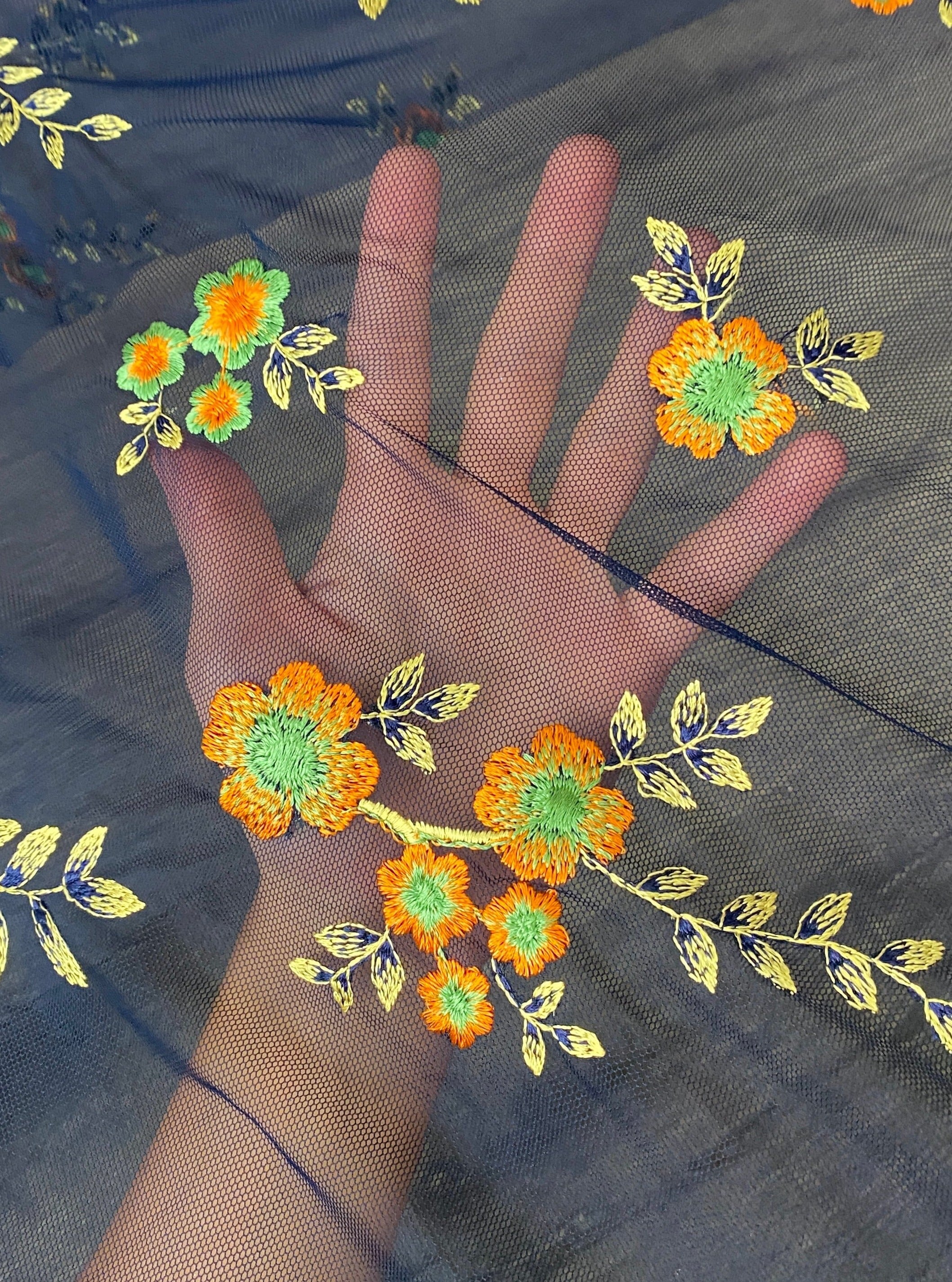 power mesh, navy floral power mesh fabric, orange floral pattern, 4 way stretch fabric, power mesh online store usa, blue color fabric, kiki textiles, soft mesh fabric