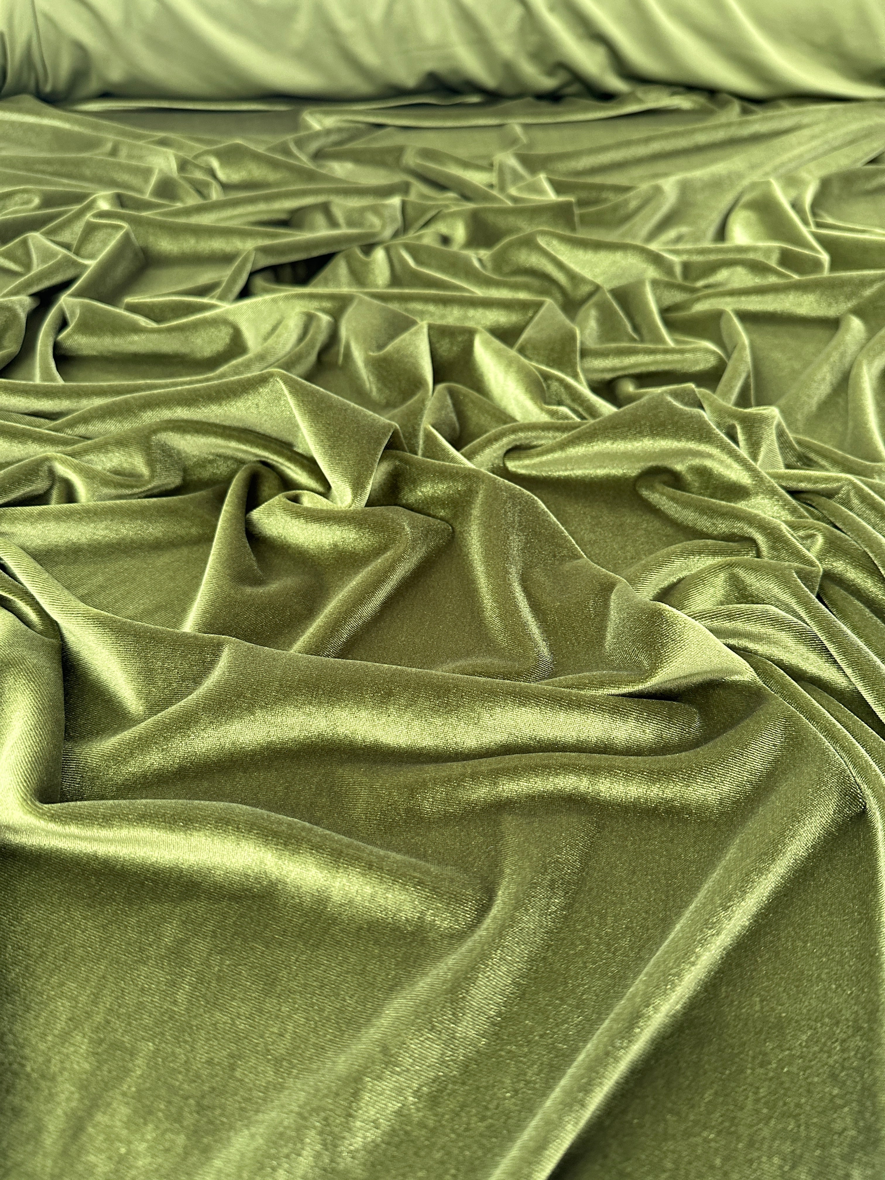 Olive stretch velvet, olive stretch velvet for gown, olive velvet for wedding, olive stretch pure velvet, mint stretch velvet for brides, green stretch fancy velvet, green color velvet for dress, olive green color stretch expensive velvet
