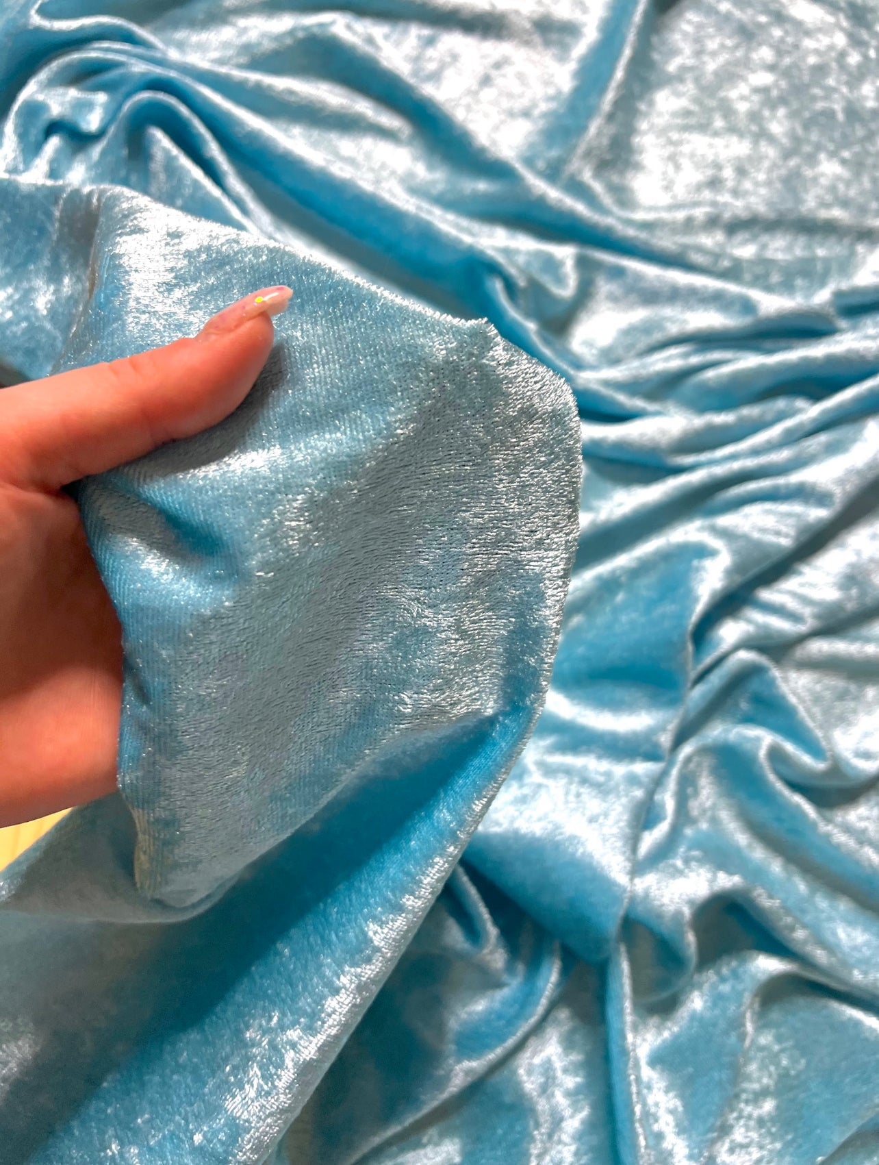 Turquois velvet,  light blue velvet, blue velvet, shinny blue velvet, sparkly blue velvet, velvet for woman, velvet for bride, velvet for party wear dresses, velvet on discount, velvet on sale, buy velvet online