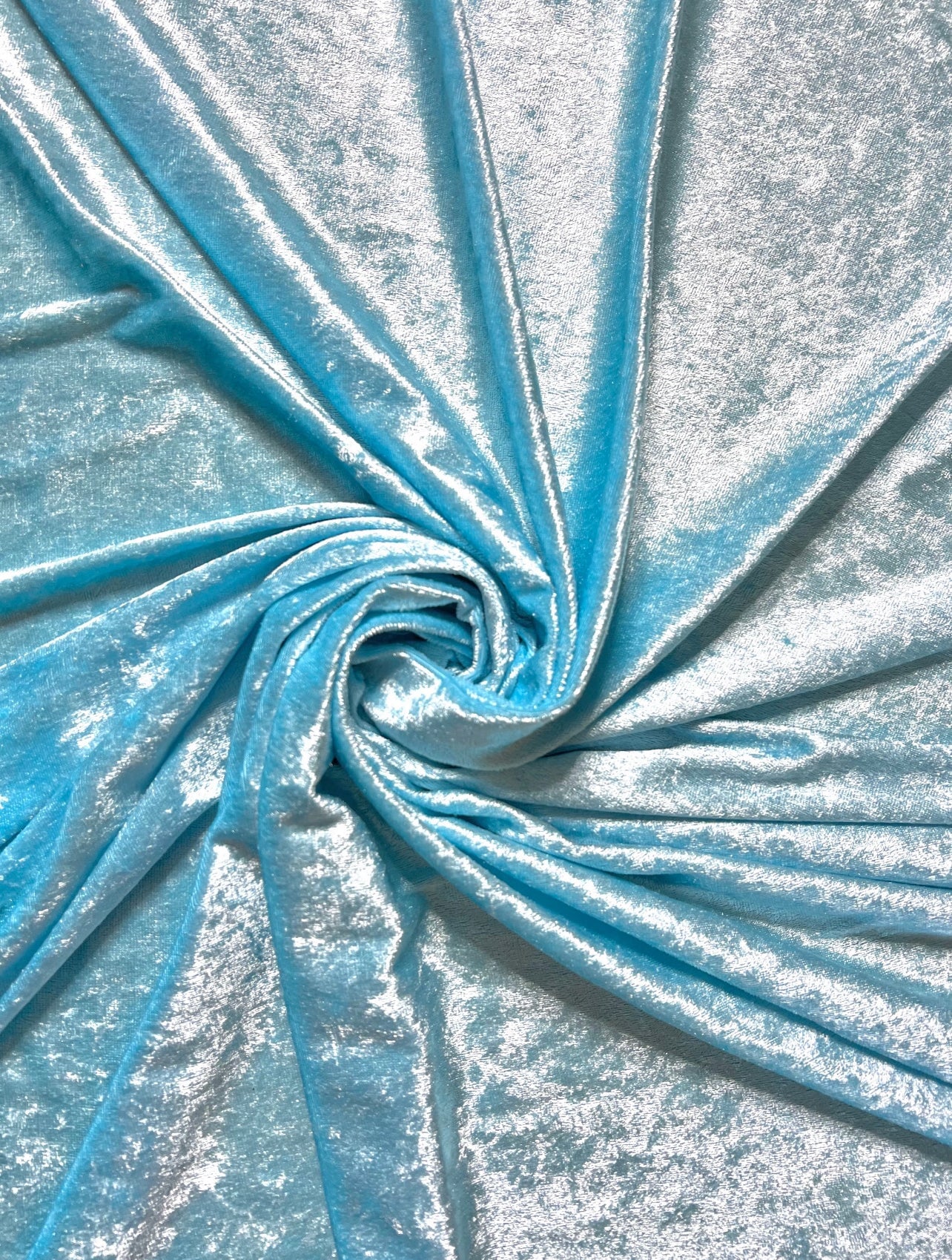 Turquois velvet,  light blue velvet, blue velvet, shinny blue velvet, sparkly blue velvet, velvet for woman, velvet for bride, velvet for party wear dresses, velvet on discount, velvet on sale, buy velvet online