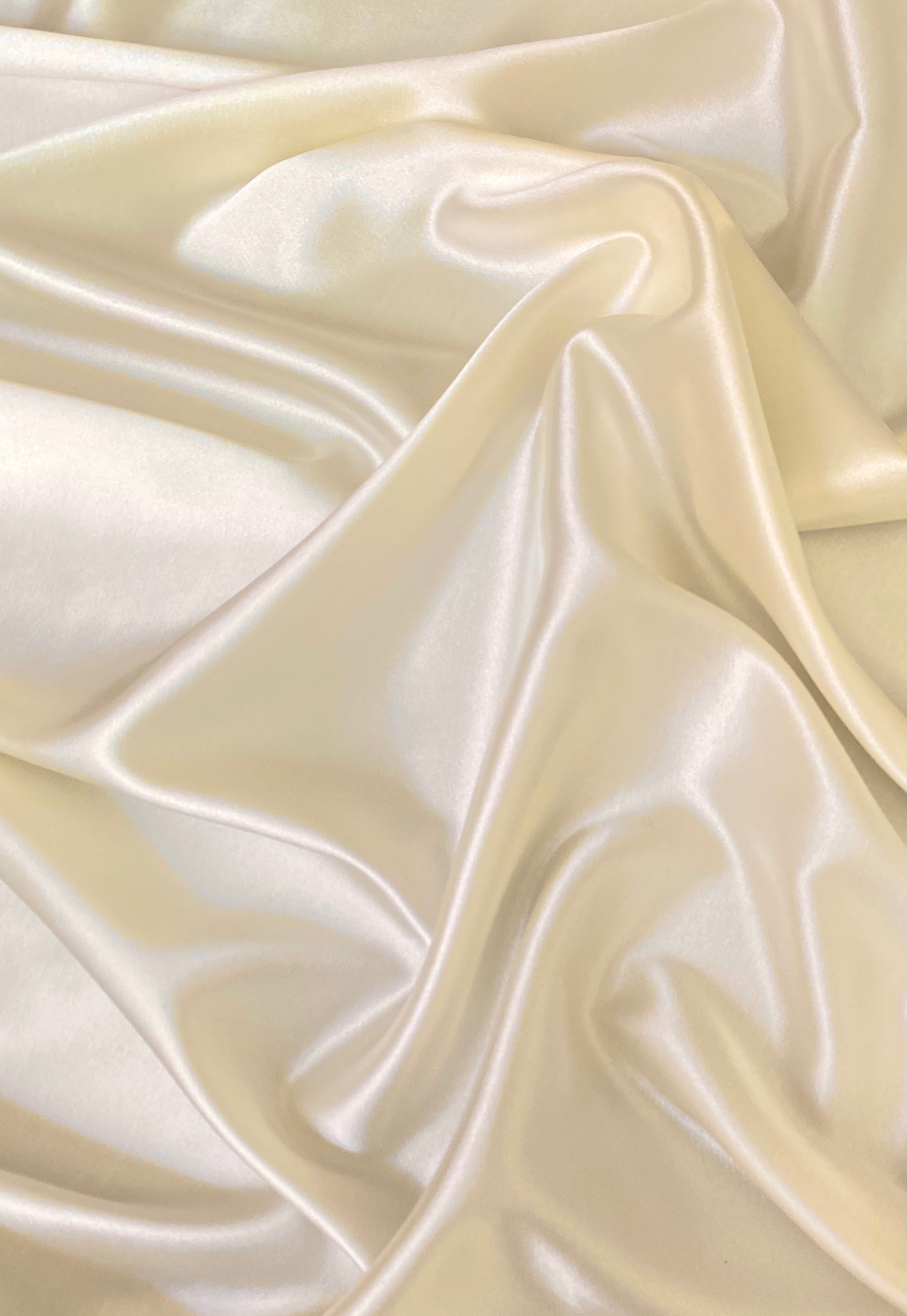 ivory stretch silk charmeuse, ivory stretch satin fabric, ivory polyester satin, ivory polyester silk, ivory bridal satin fabric, ivory solid silk, ivory smooth silk fabric, ivory silk material