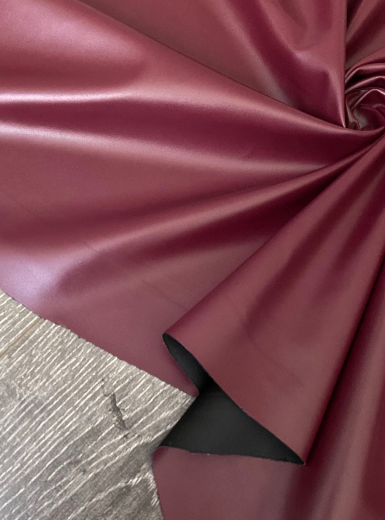 burgundy stretch faux leather, burgundy stretch pleather, burgundy stretch soft vinyl, burgundy stretch vinyl, faux leather stretch for clothing, Faux Leather for jackets, Faux Leather for bags, Faux Leather on discount, Faux Leather on sale, premium Faux Leather, burgundy Faux Leather, maroon Faux Leather, Faux Leather for tops, Faux Leather for leggings
