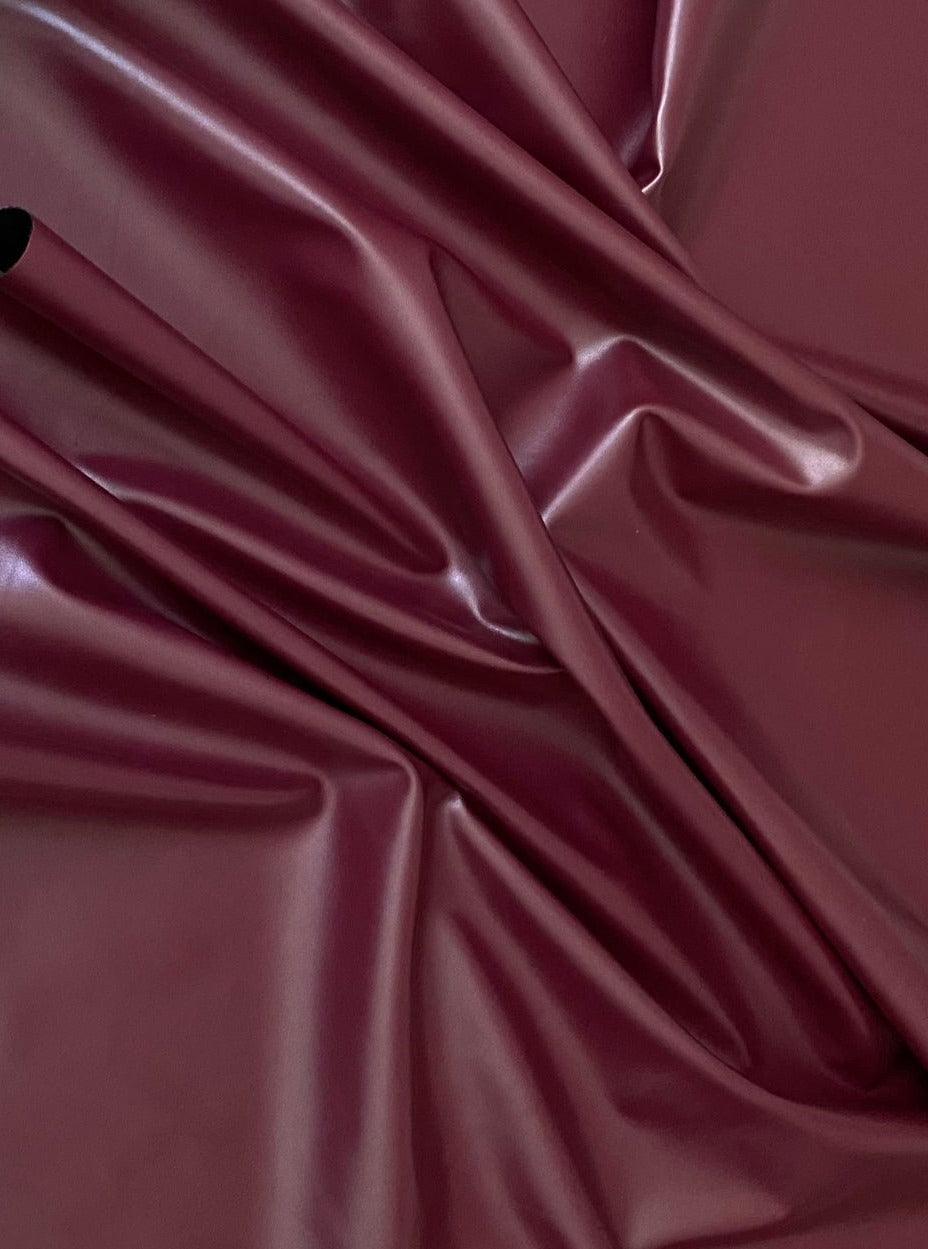 burgundy stretch faux leather, burgundy stretch pleather, burgundy stretch soft vinyl, burgundy stretch vinyl, faux leather stretch for clothing, Faux Leather for jackets, Faux Leather for bags, Faux Leather on discount, Faux Leather on sale, premium Faux Leather, burgundy Faux Leather, maroon Faux Leather, Faux Leather for tops, Faux Leather for leggings