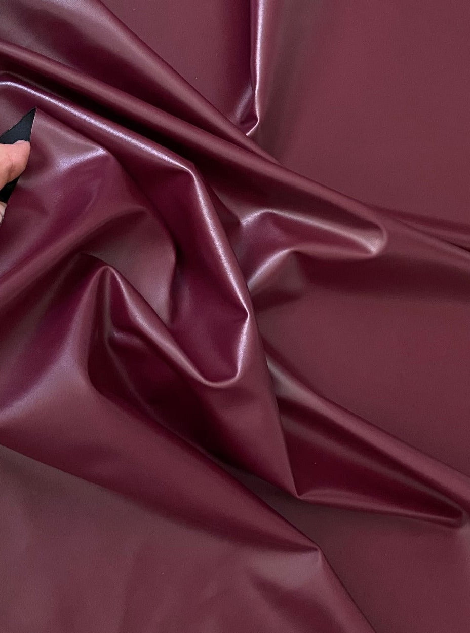 burgundy stretch faux leather, burgundy stretch pleather, burgundy stretch soft vinyl, burgundy stretch vinyl, faux leather stretch for clothing, Faux Leather for jackets, Faux Leather for bags, Faux Leather on discount, Faux Leather on sale, premium Faux Leather, burgundy Faux Leather, maroon Faux Leather, Faux Leather for tops, Faux Leather for leggings