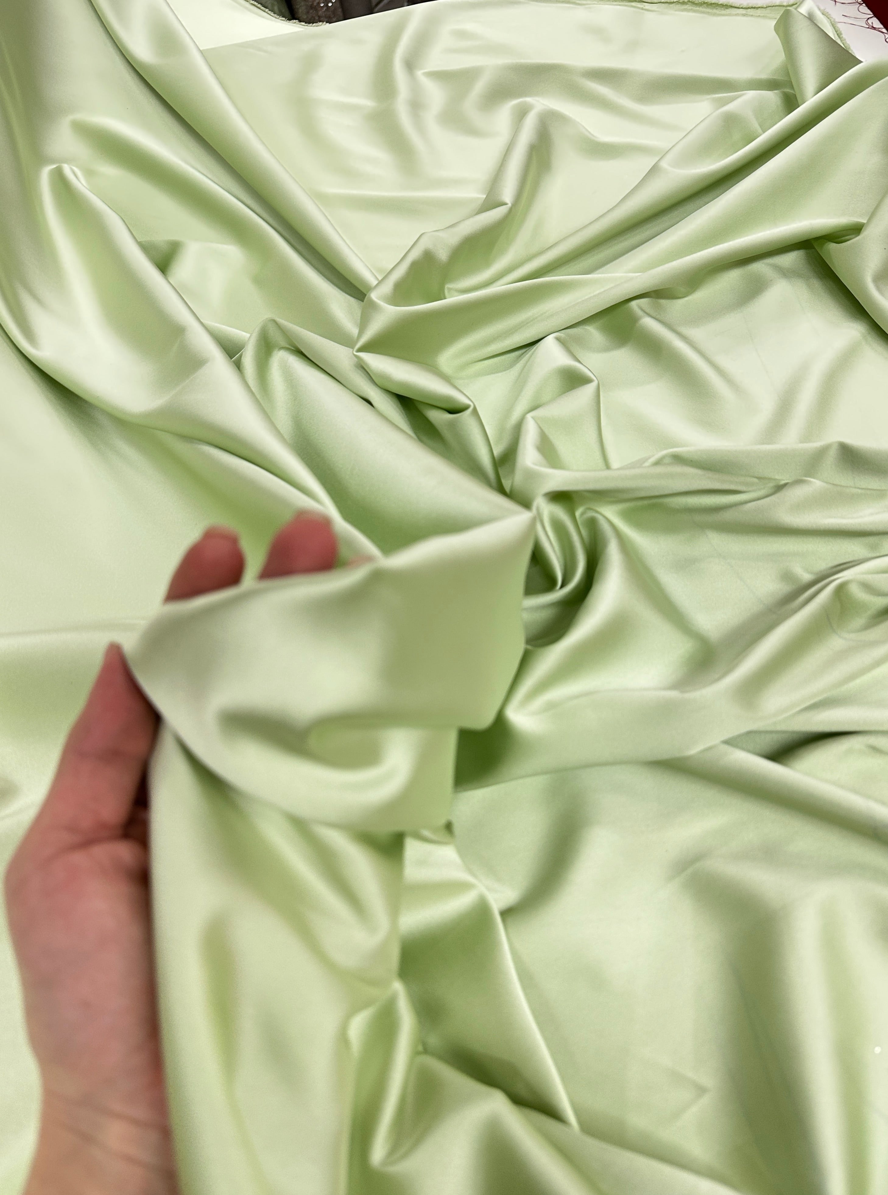 shiny silk fabric, solid silk, solid satin, stretch silk charmeuse, silk fabric by the yard, natural silk, pure silk, 100% pure silk, natural fabric, kiki textiles, online fabric store usa, luxurious fabric, silk satin online, fancy silk, soft silk, smooth silk, 100% natural silk, charmeuse satin, green natural silk, green silk, pistachio natural silk, pistachio silk, green natural stretch silk, pistachio silk, pistachio silk, baby pink silk, green silk satin, pistachio silk satin, light green silk