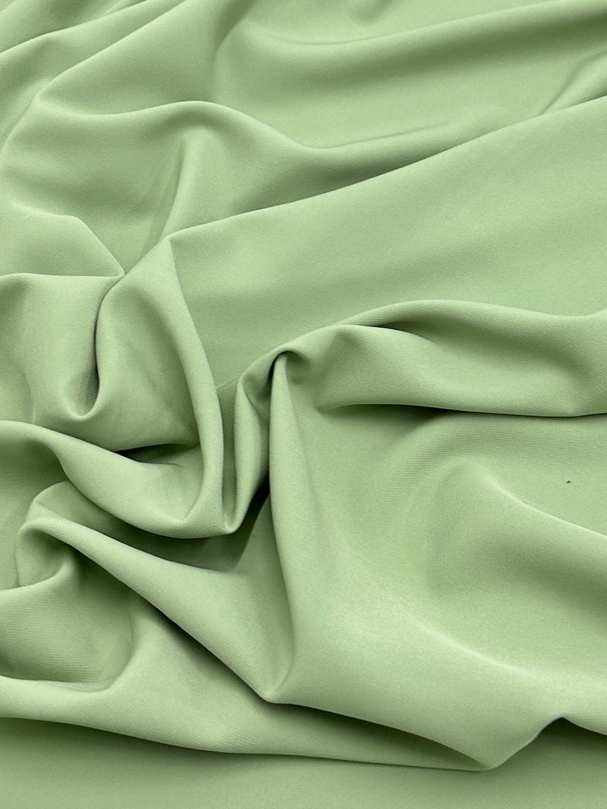 pistachio stretch crepe, pistachio color fabric, green fabric, green dress for woman, pistachio bridal dress, bridal luxury dress, fabric for woman, 4 way stretch, buy fabric online, discounted fabric, fabric on sale, crepe fabric, bridal crepe, crepe for dress, wedding crepe, chiffon crepe, crepe clothing material