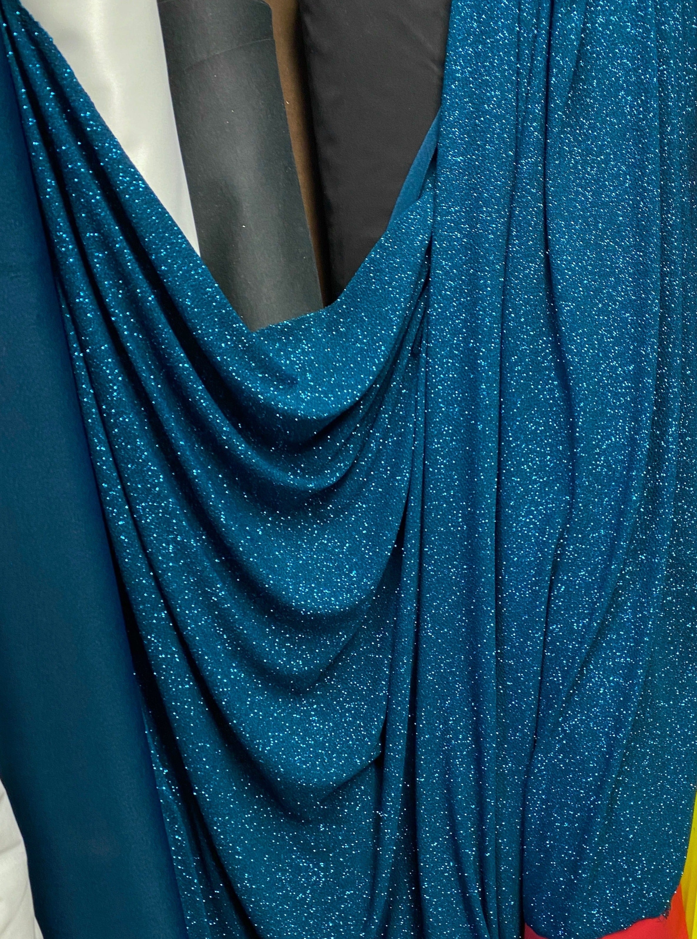 teal spandex lurex, teal spandex lurex for woman, light blue spandex lurex, party wear teal spandex lurex, shiny lurex, spandex lurex for bride, lurex on discount, lurex on sale, buy metallic lurex online, lurex for gown, silver spandex lurex