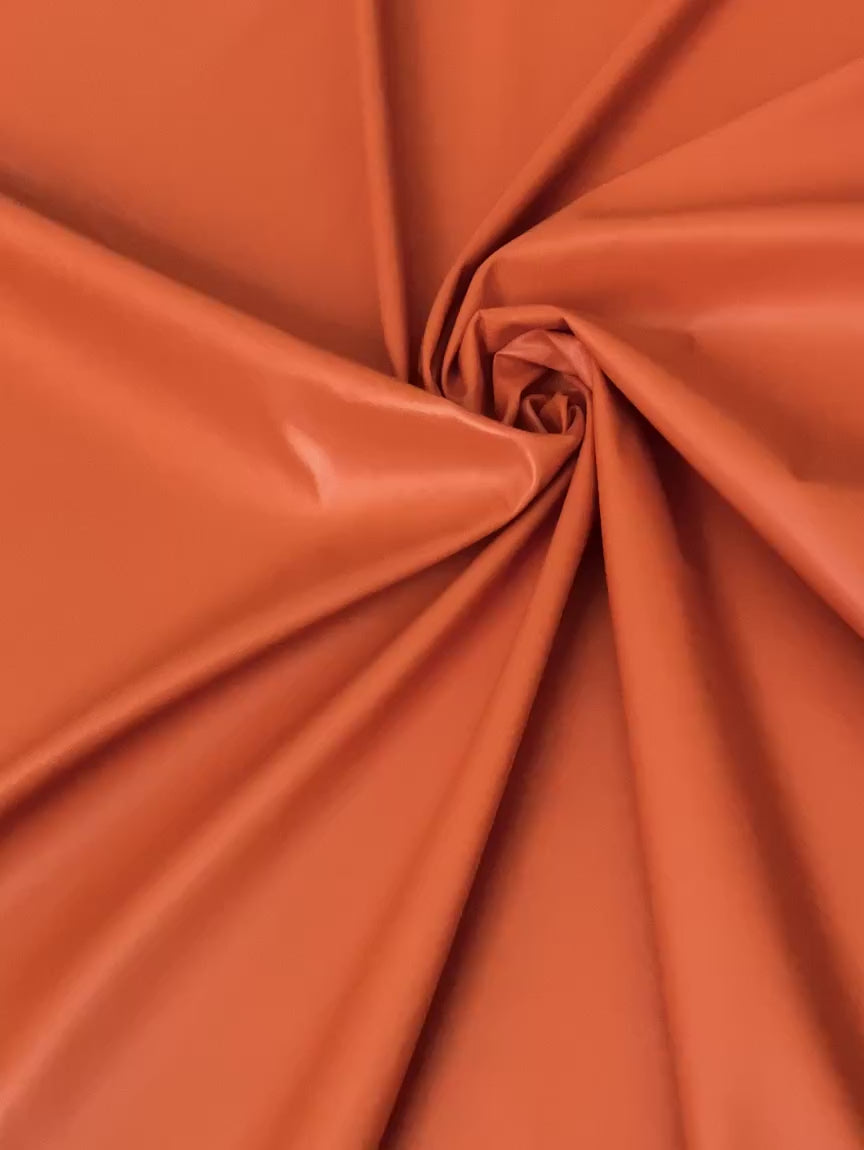 orange stretch Faux Leather, light orange Faux Leather, Faux Leather for jackets, Faux Leather for bags, Faux Leather on discount, Faux Leather on sale, premium Faux Leather, dark orange Faux Leather, pale orange Faux Leather, Faux Leather for tops, Faux Leather for leggings