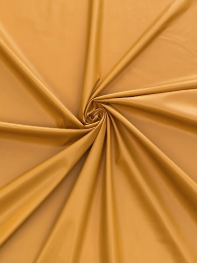mustard stretch Faux Leather, dark orange leather, shiny faux leather, orange faux leather for woman, faux leather for costumes, faux leather for home decor, 2 way stretch faux leather, leather for blazers, cheap leather, discounted leather, leather on sale