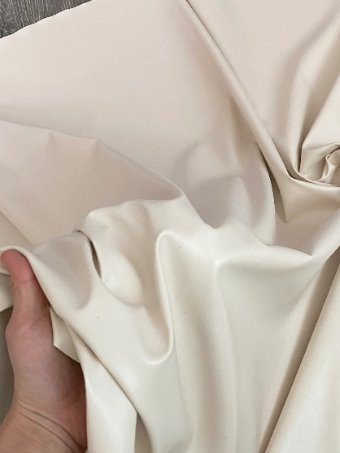 beige stretch faux leather, beige stretch pleather, beige stretch soft vinyl, beige stretch vinyl, faux leather stretch for clothing, Faux Leather for jackets, Faux Leather for bags, Faux Leather on discount, Faux Leather on sale, premium Faux Leather, light color Faux Leather, Faux Leather for tops, Faux Leather for leggings