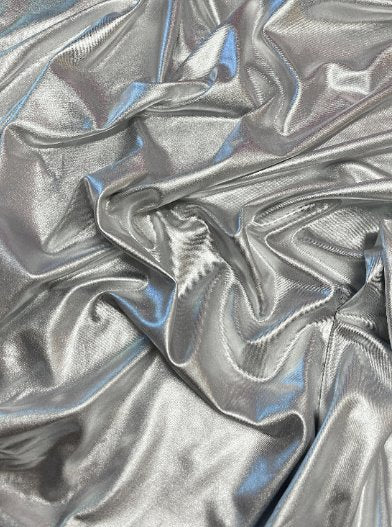 Silver Slinky Foiled Jersey, dark silver Slinky Foiled Jersey, light silver Slinky Foiled Jersey, grey Slinky Foiled Jersey for woman, Slinky Foiled Jersey for bride, Slinky Foiled Jersey on discount, Slinky Foiled Jersey on sale, premium Slinky Foiled Jersey, kiki textile Slinky Foiled Jersey, Slinky Foiled Jersey for party wear, Slinky Foiled Jersey for winter