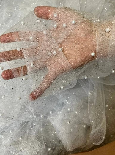 white glitter Pearl Tulle, bright white pearl Tulle, off white pearl tulle, milky white Pearl Tulle for party wear, white Pearl Tulle for dress, Pearl Tulle for woman, Pearl Tulle for bride, Pearl Tulle on discount, Pearl Tulle on sale, premium Pearl Tulle, buy Pearl Tulle online